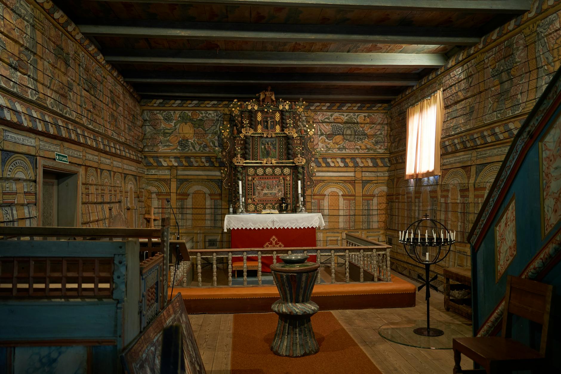 Decorated interior of a historic Norwegian stave church