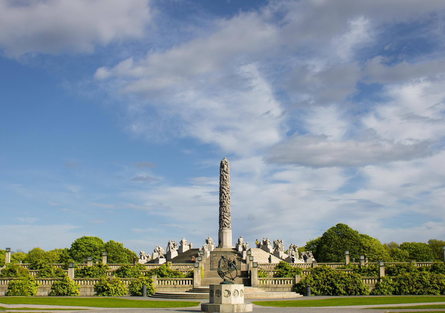 Vigeland sculpture park monument in Oslo under blue sky