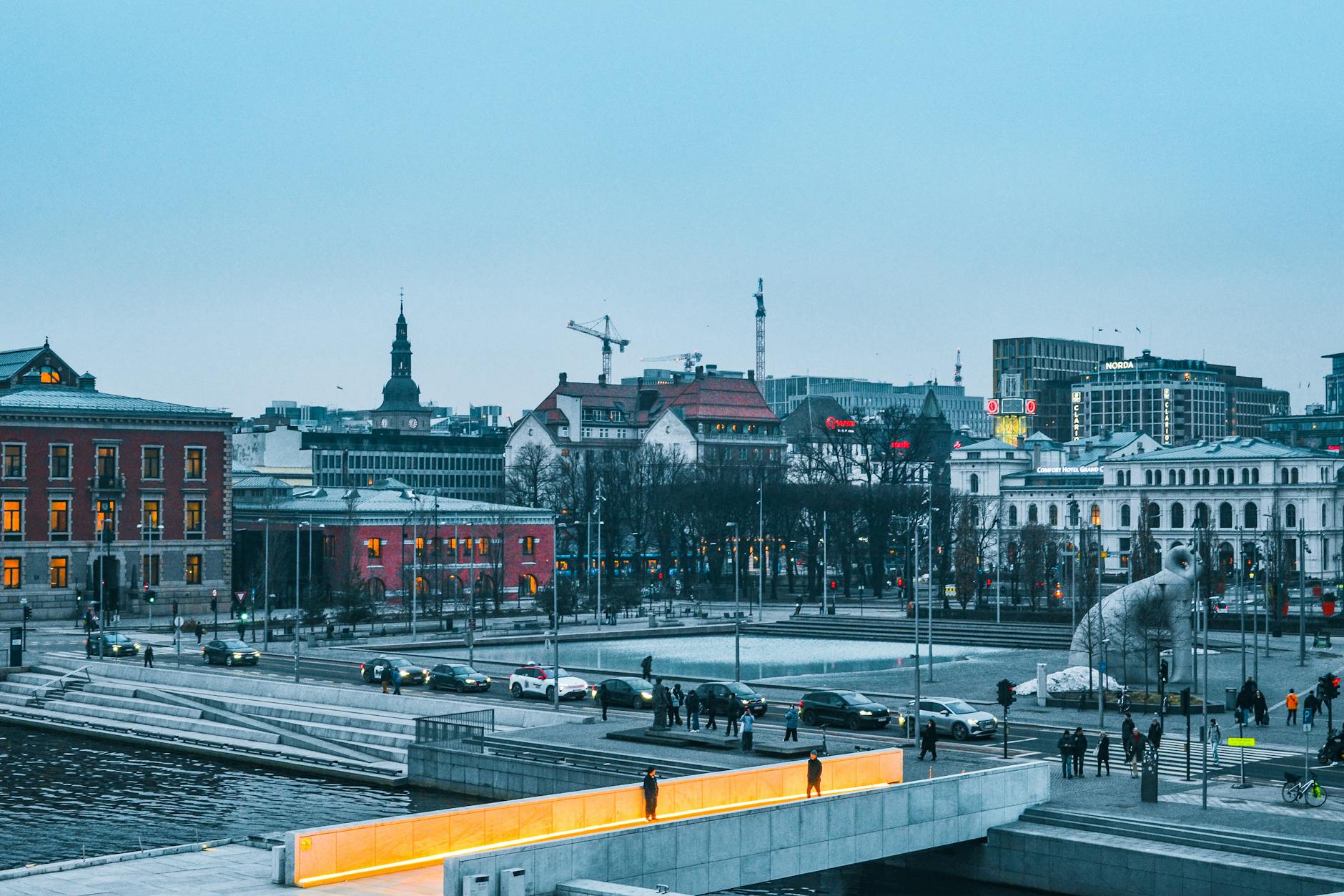 Oslo cityscape with lit bridge at twilight