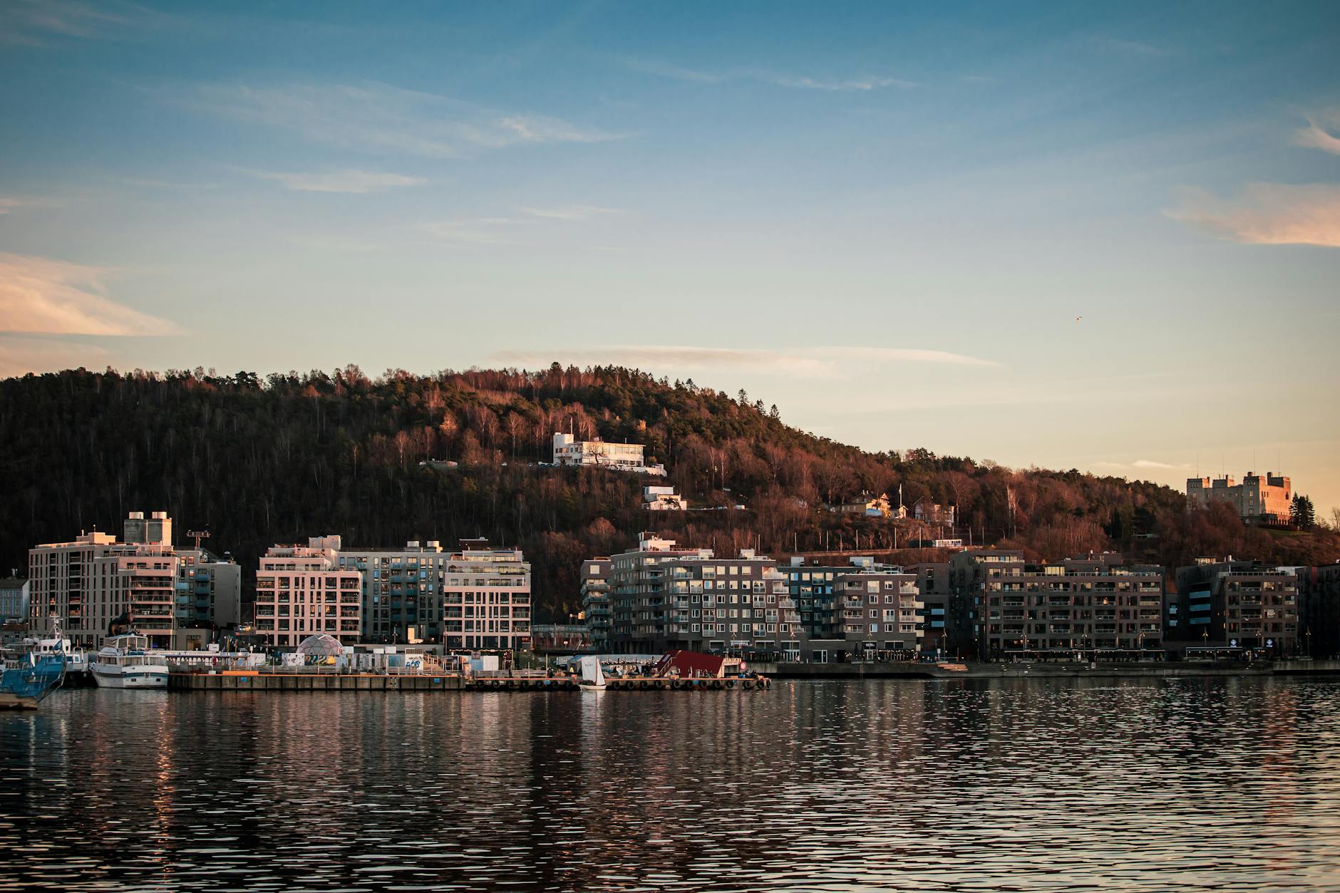 Oslo waterfront skyline at sunset