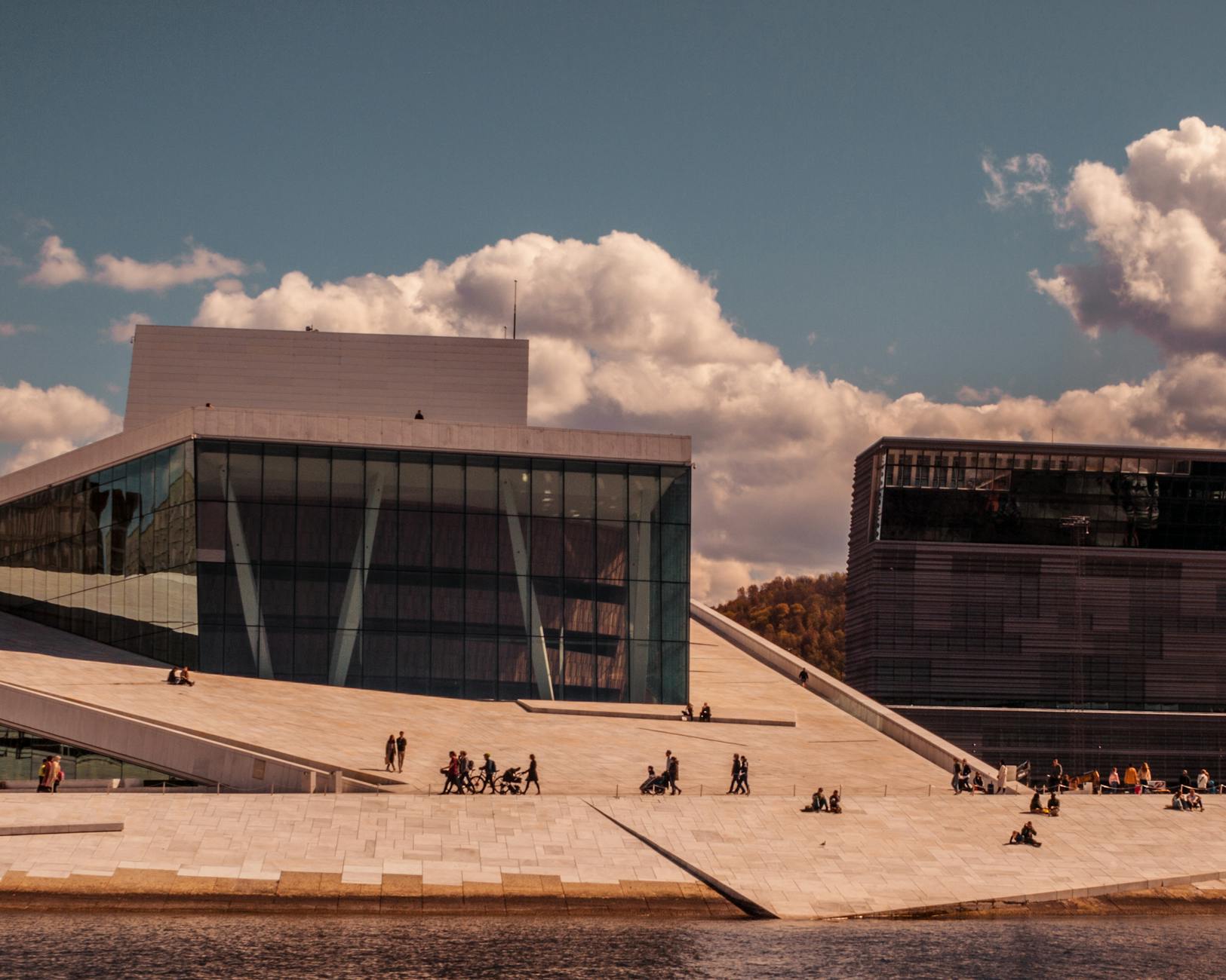 Tourists outside Oslo Opera House