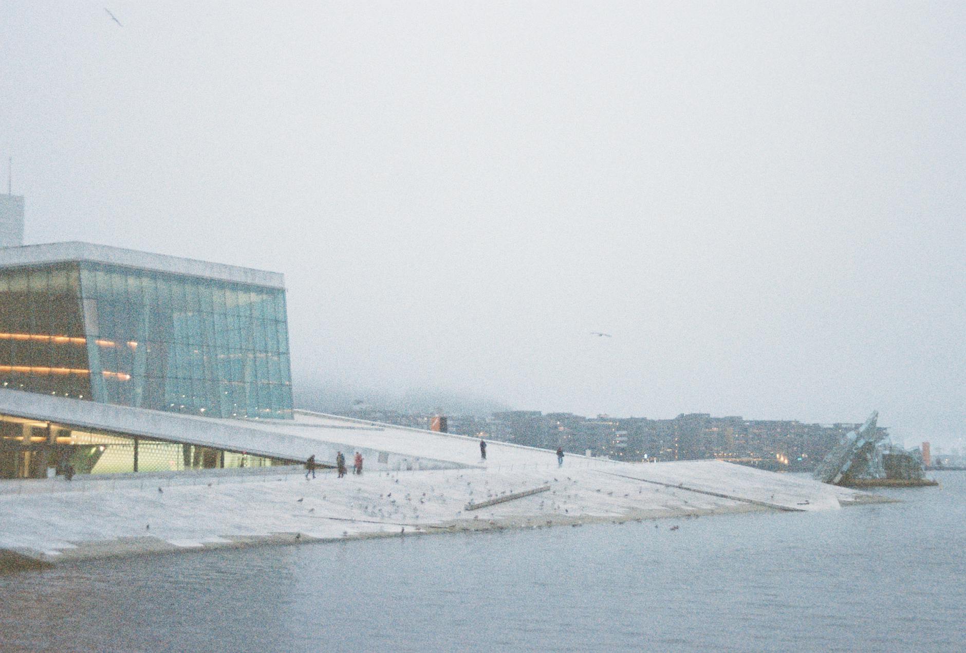 Winter view of Oslo Opera House by the waterfront