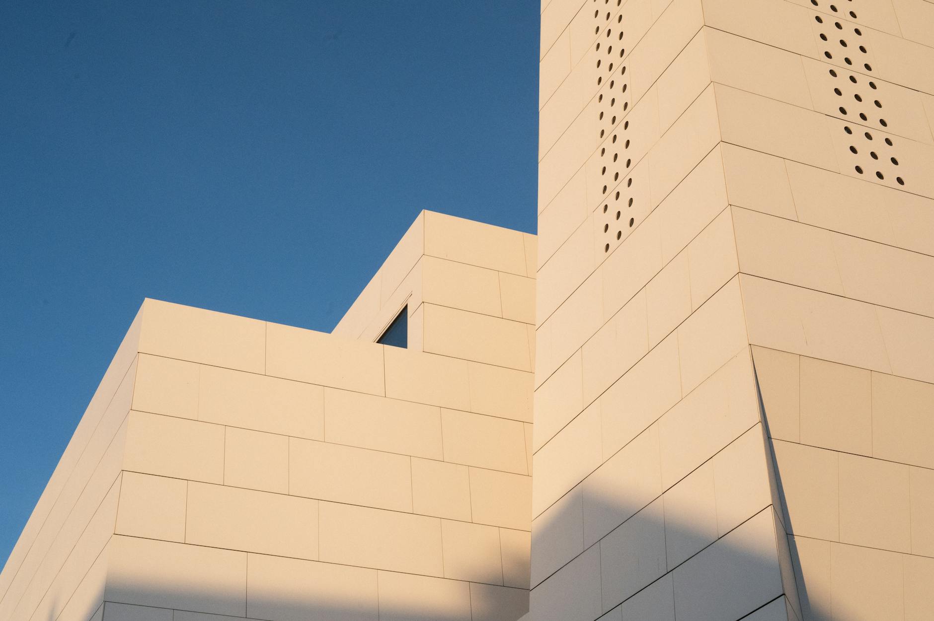 Modern Norwegian architectural structure under clear sky