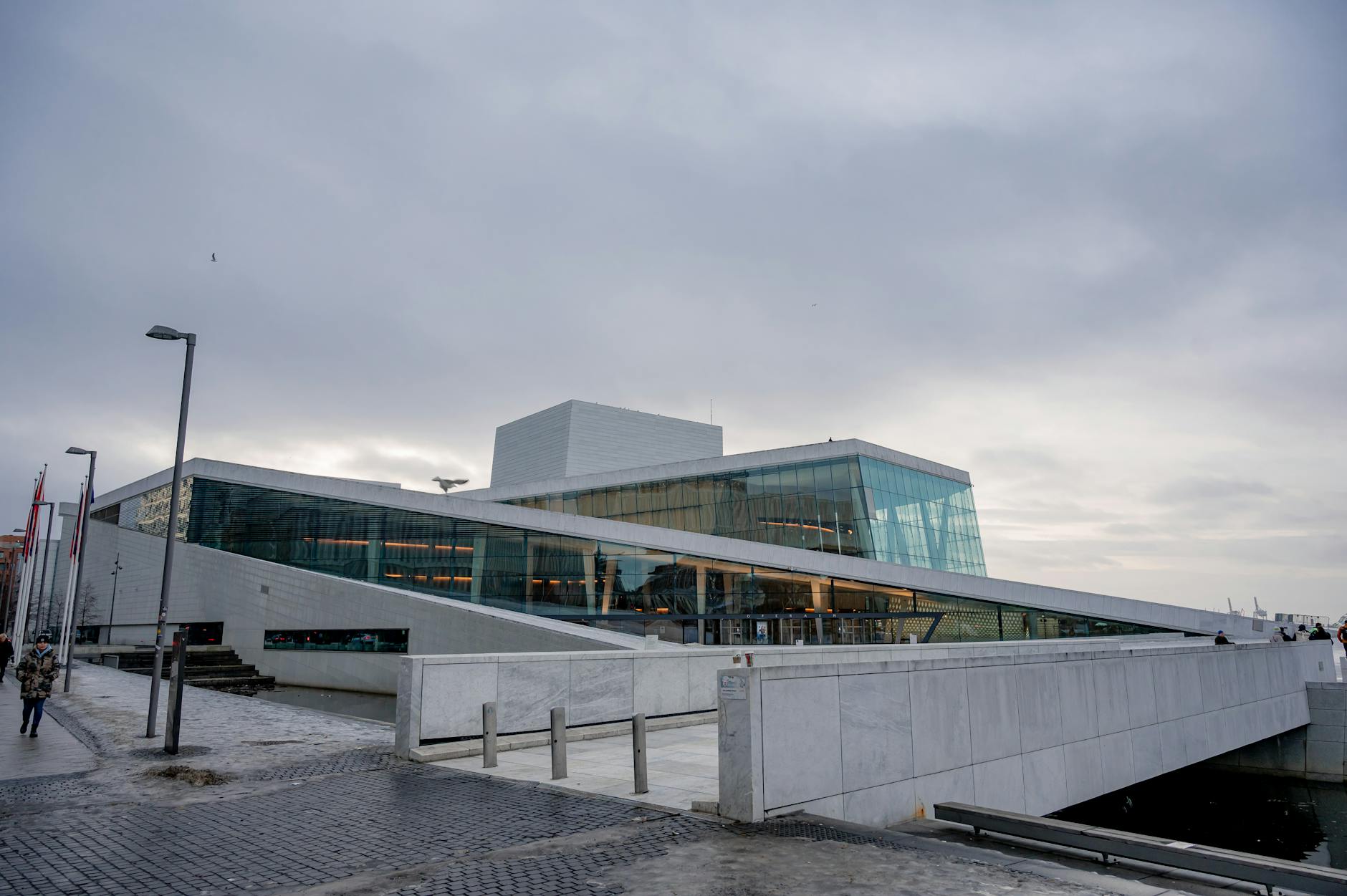 Winter scene at Oslo Opera House with modern waterfront architecture