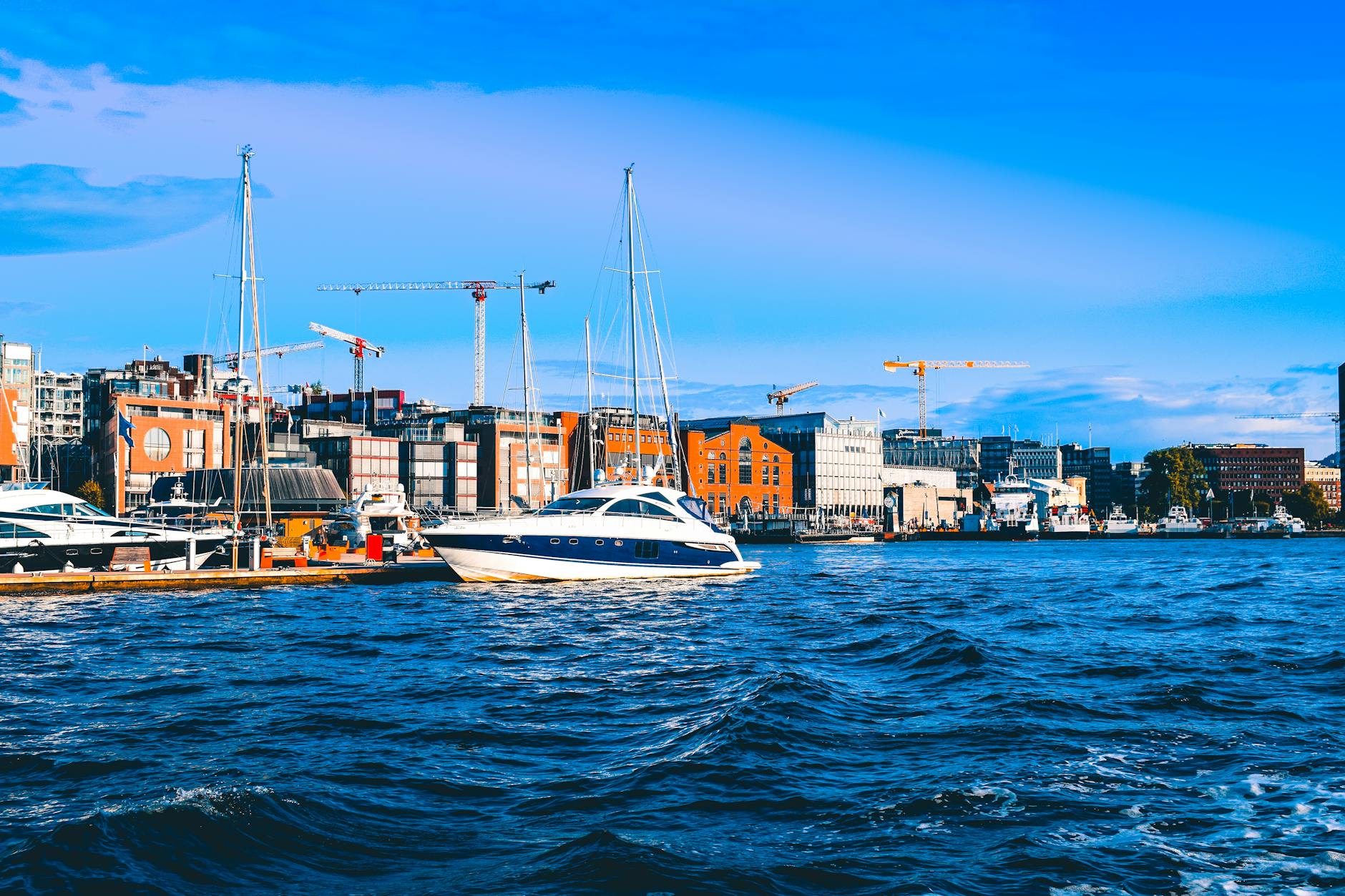 Yacht docked at an Oslo marina on a clear day