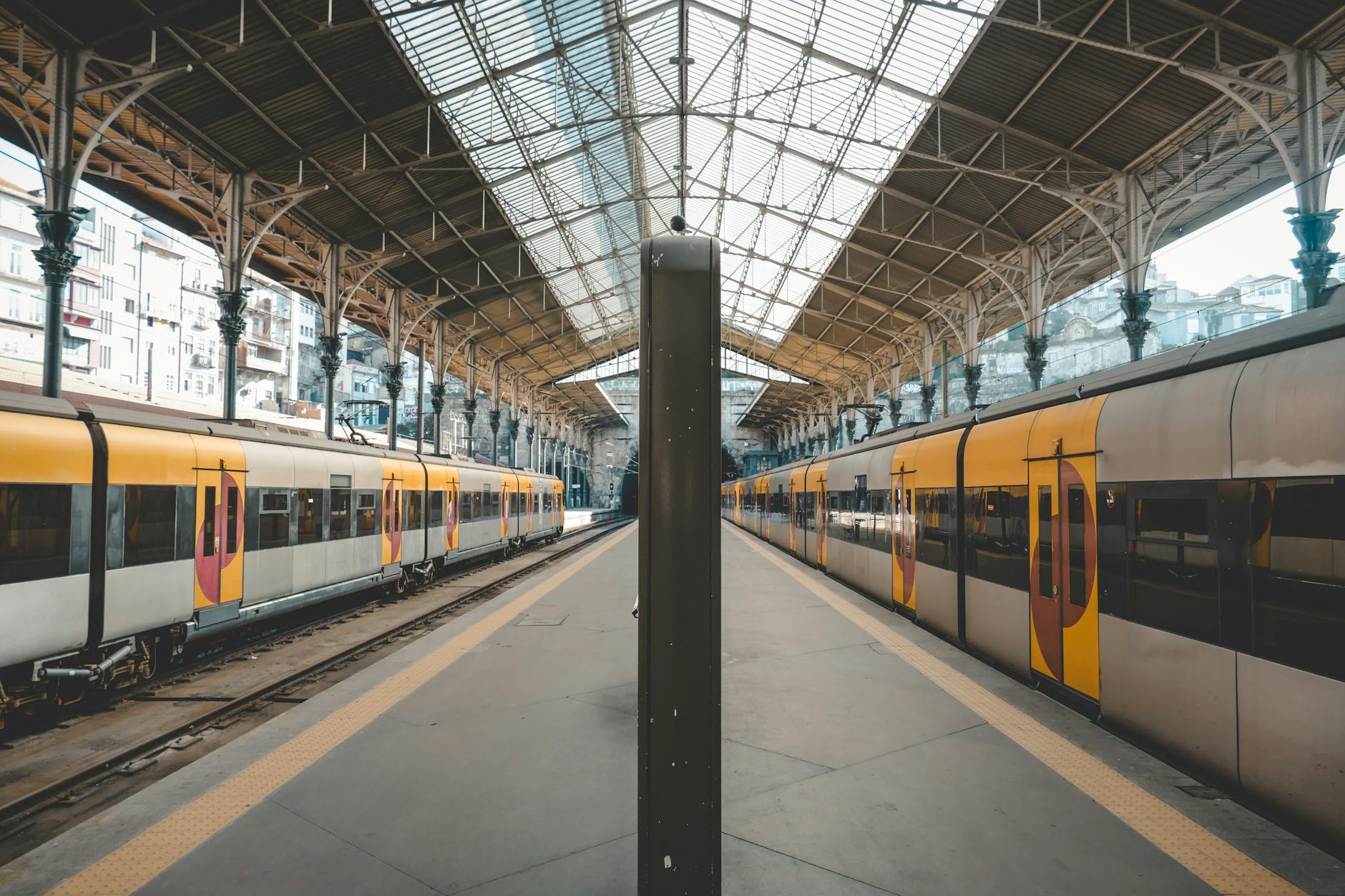 Wide-angle view of Sao Bento station with trains in Porto