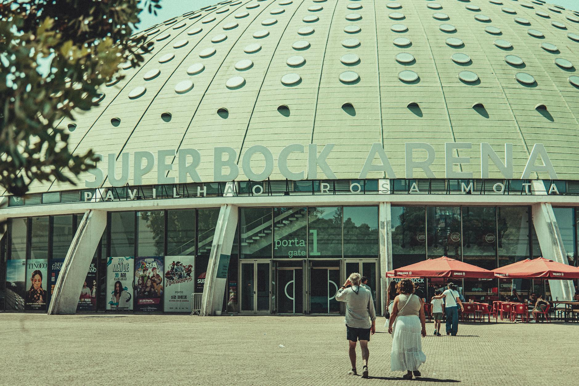 People entering Super Bock Arena in Porto on a sunny day