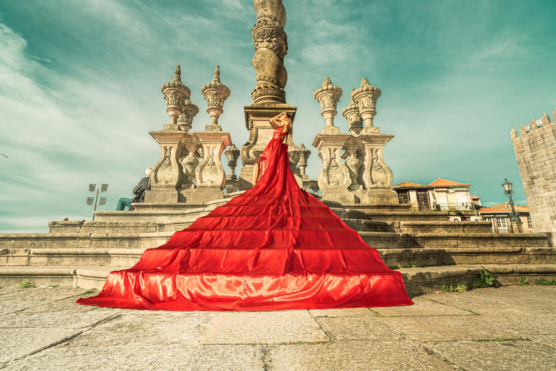 Model in a red gown at Porto Cathedral