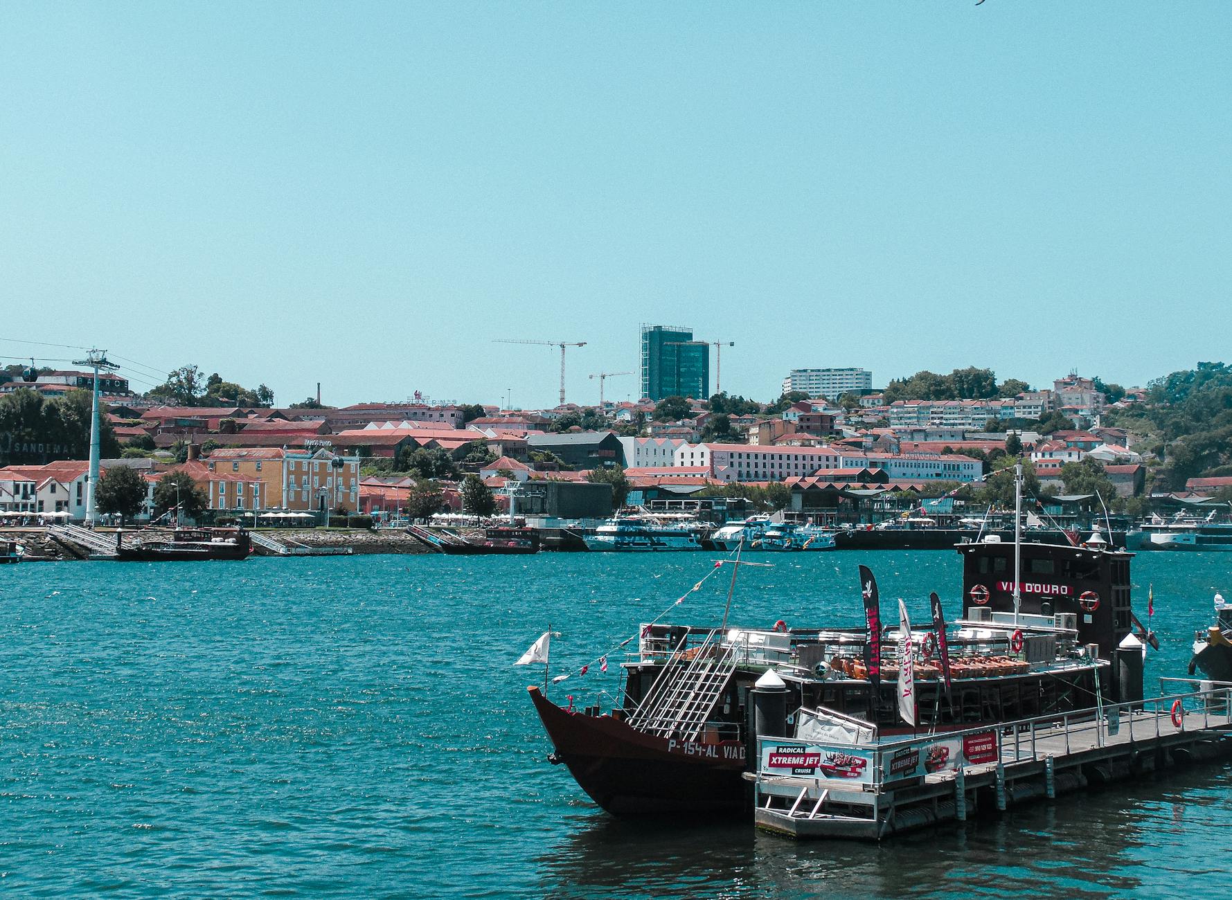 Douro River, traditional boats, and Ribeira district in Porto