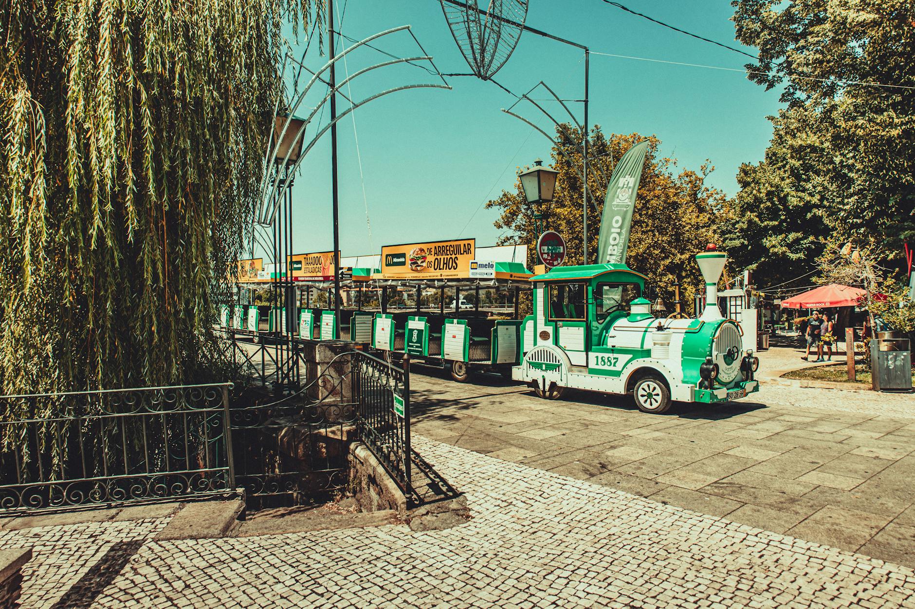 Charming street train in a Porto urban park