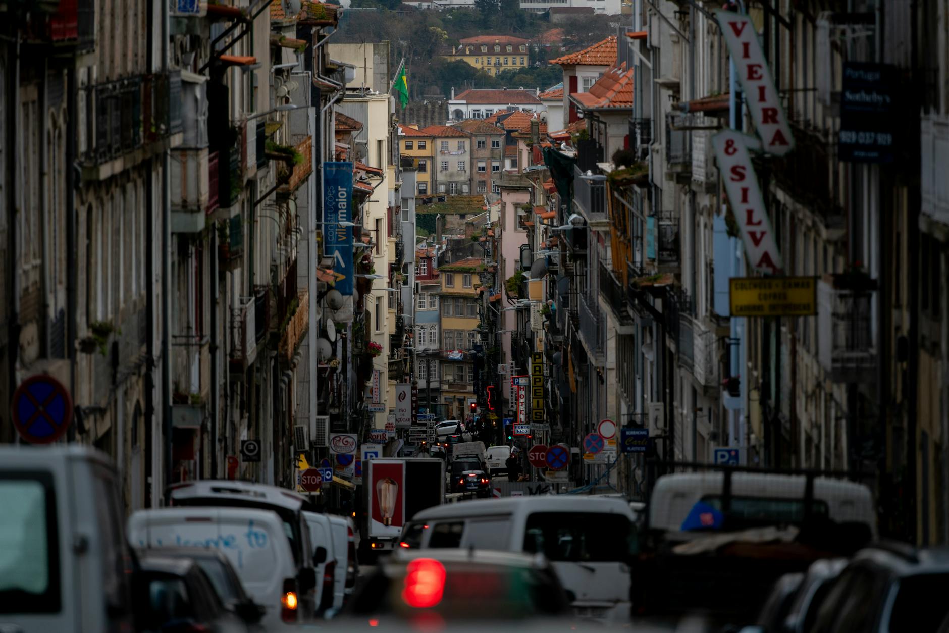 Busy Porto street with urban life and architecture