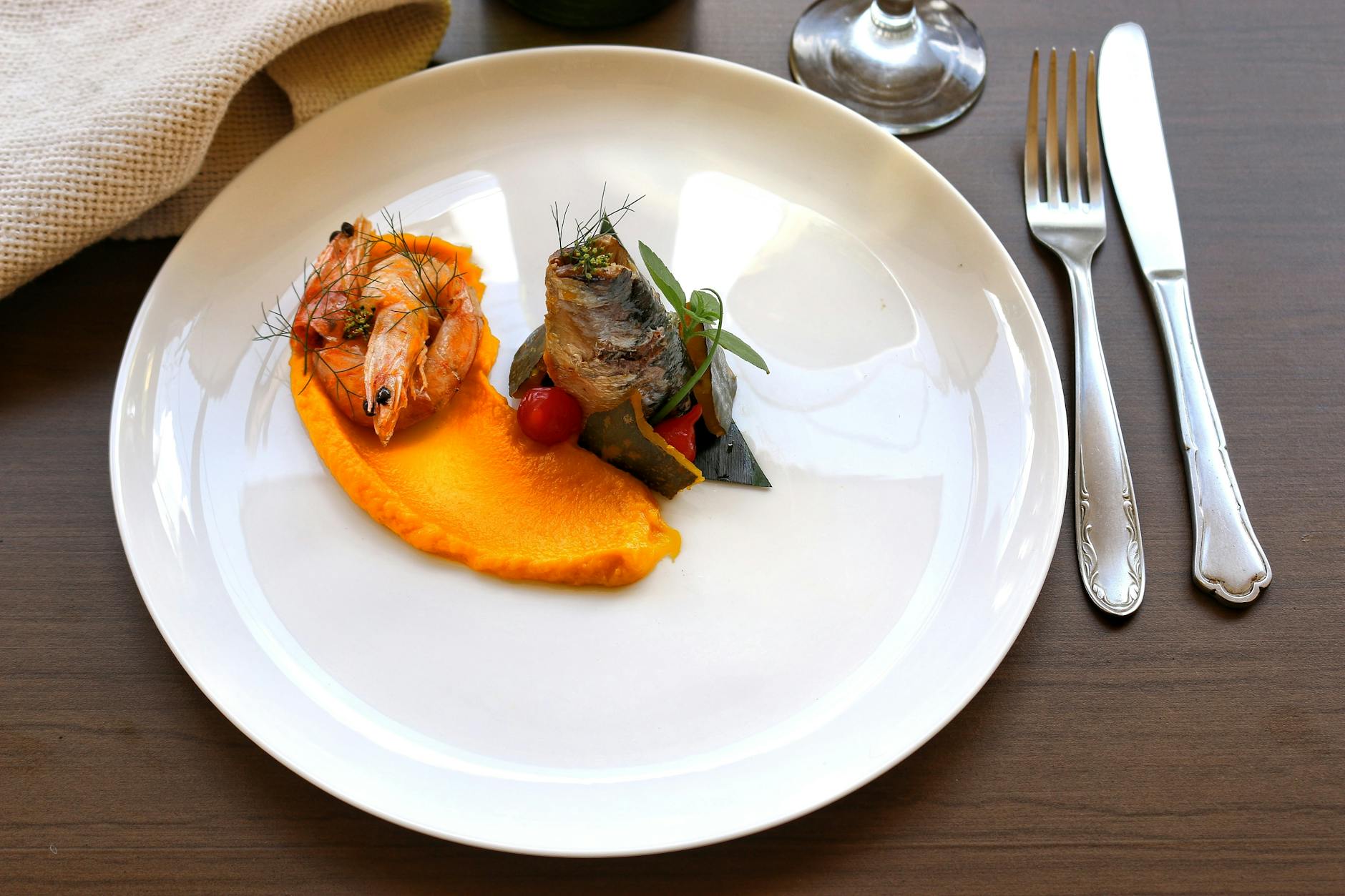 Elegantly plated seafood dish in Oporto
