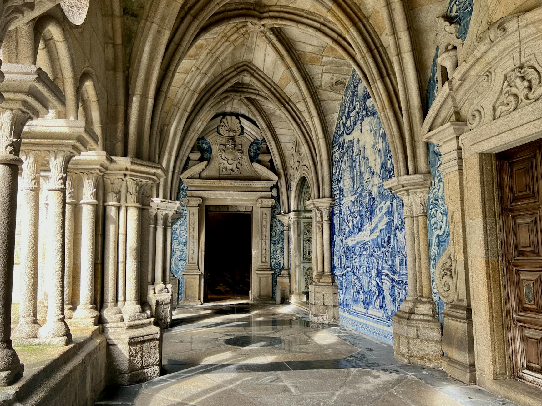 Gothic architecture and blue tilework inside Porto Cathedral cloisters