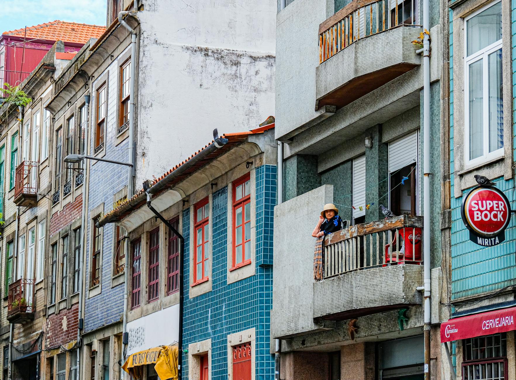 Pastel residential buildings with balconies in Porto