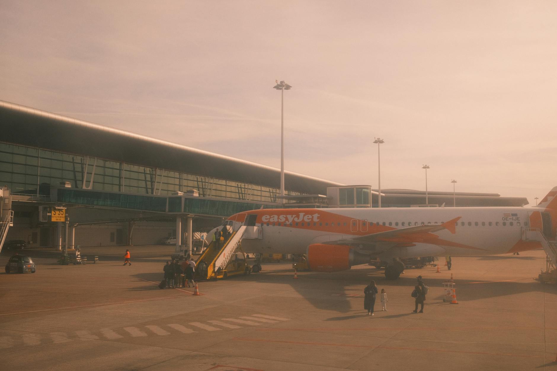 Aircraft parked at Porto airport in warm daylight