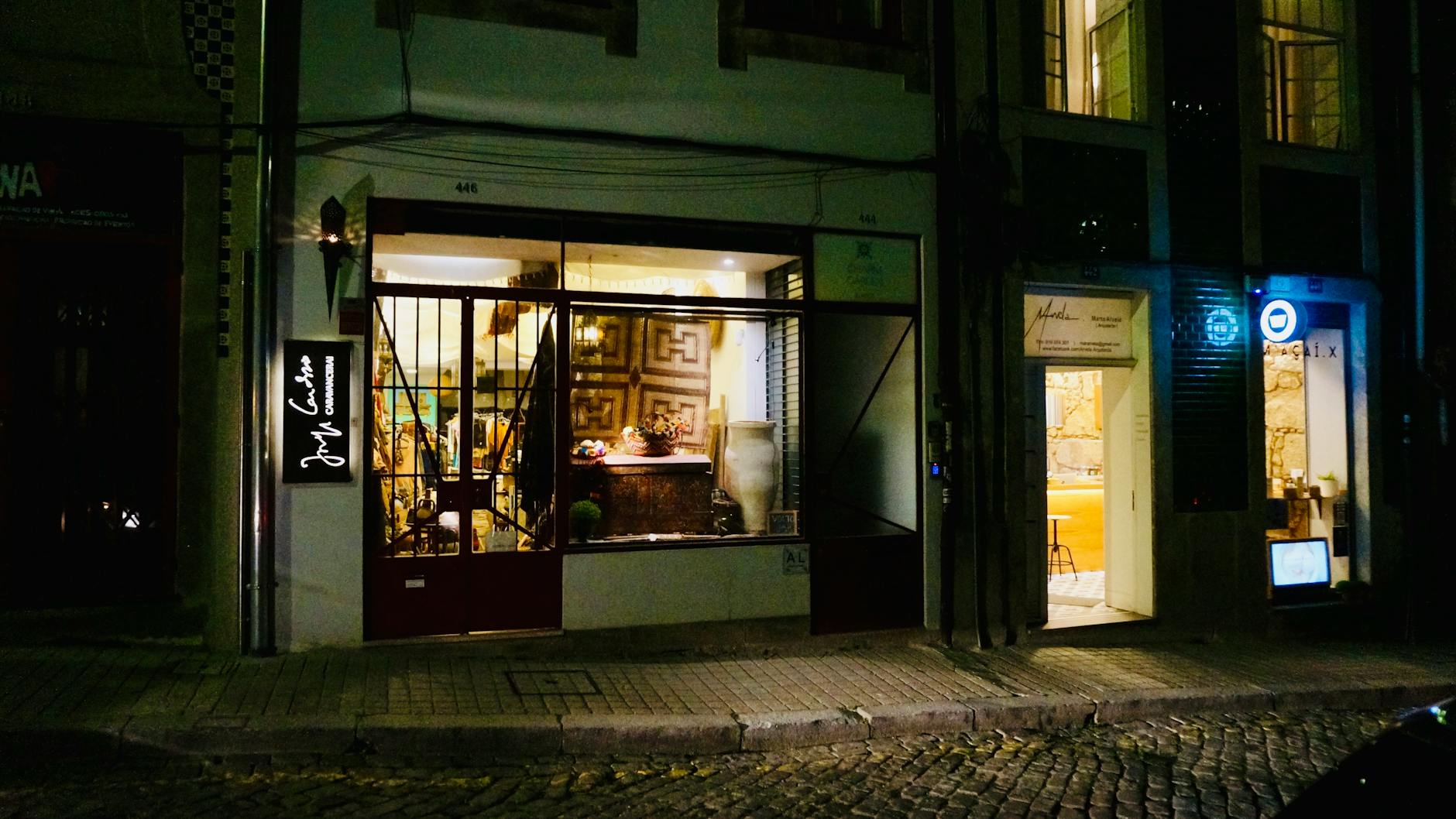 Cozy Porto shopfront illuminated at night