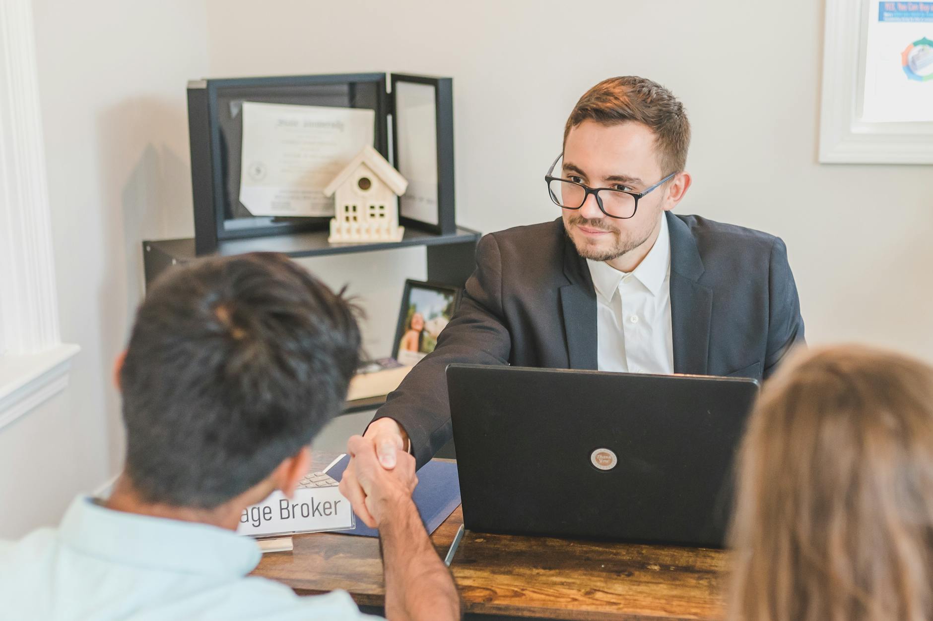 Business professionals sealing a deal with a handshake