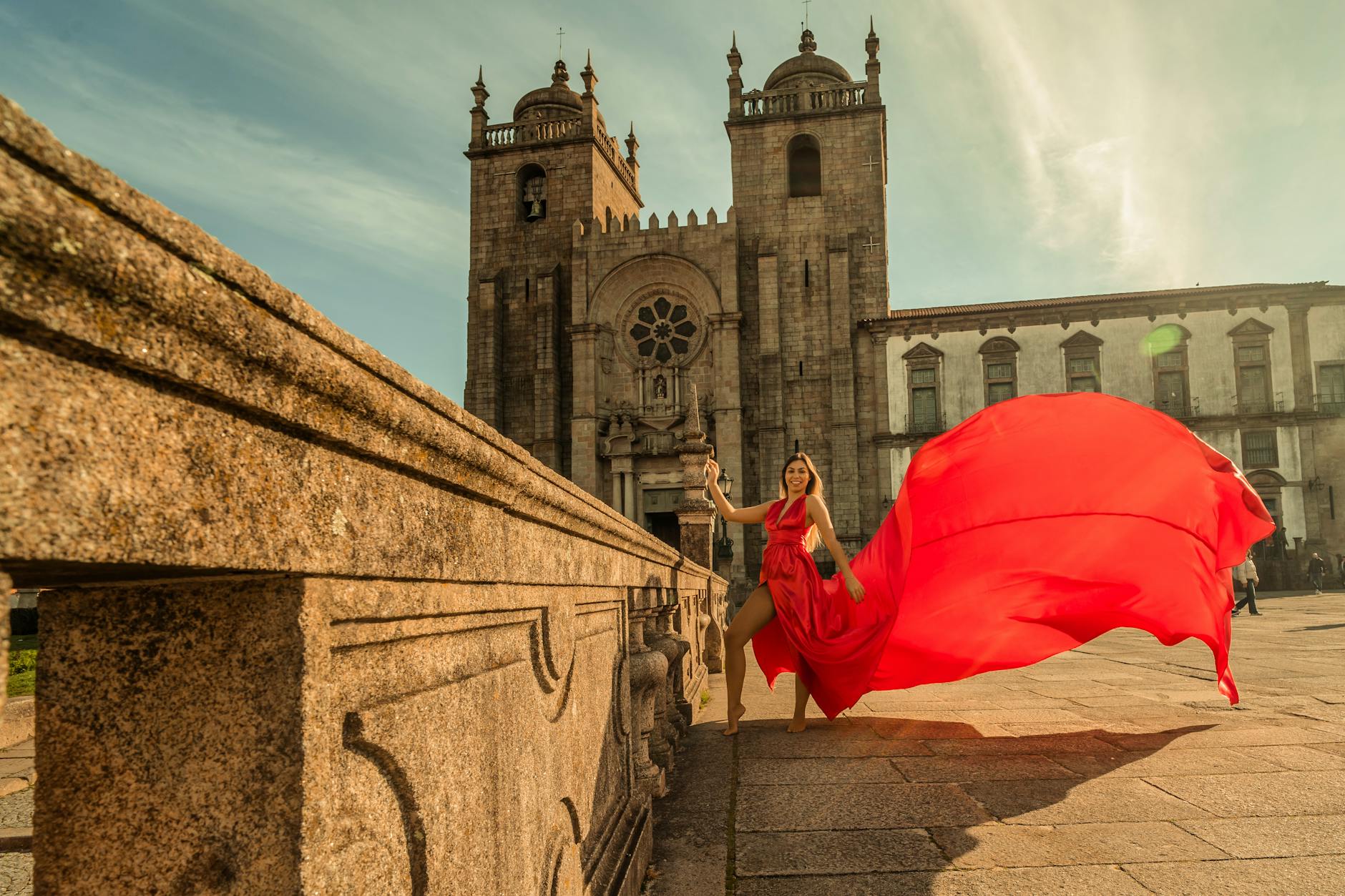 Traveler posing at Porto Cathedral on a sunny day