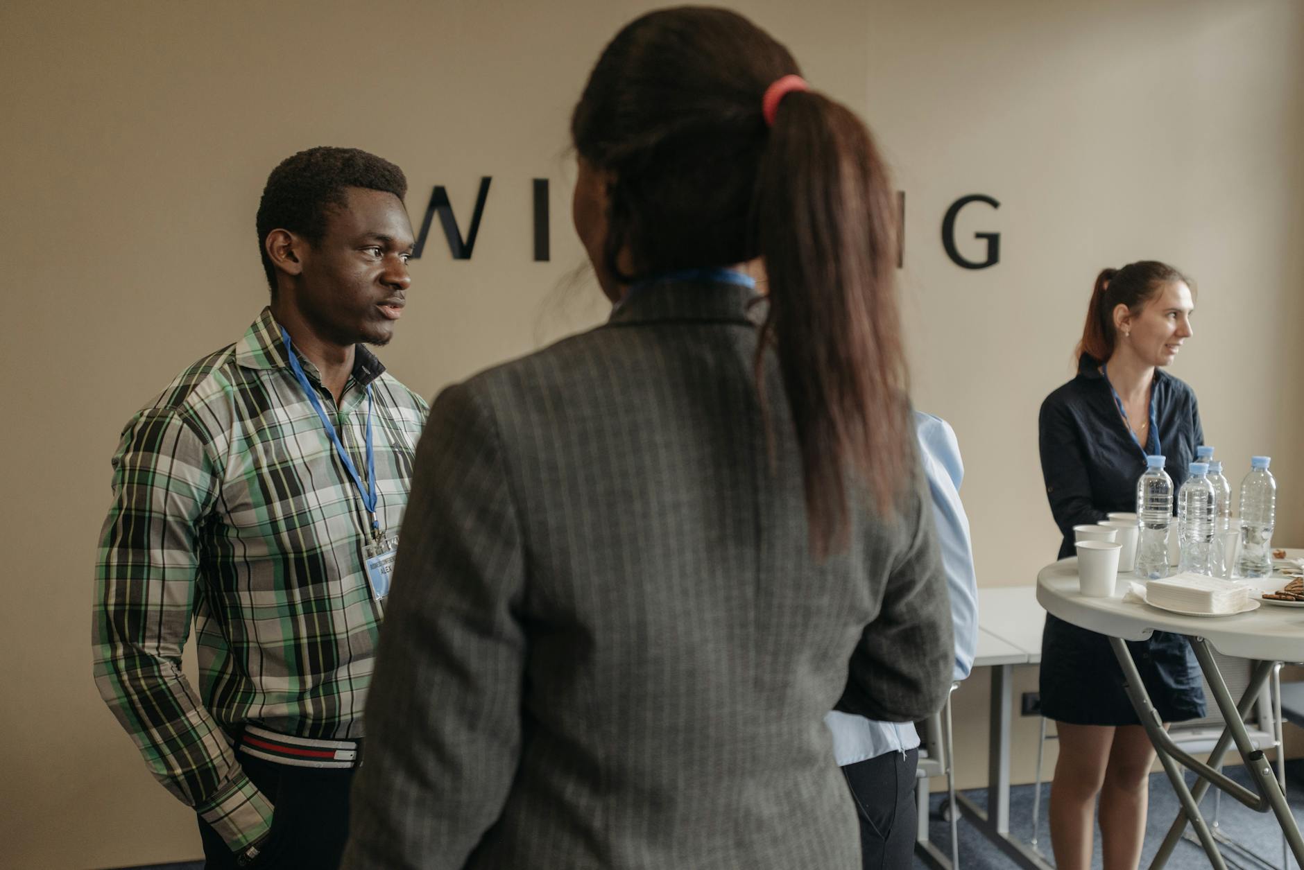 Professionals networking during an indoor business seminar