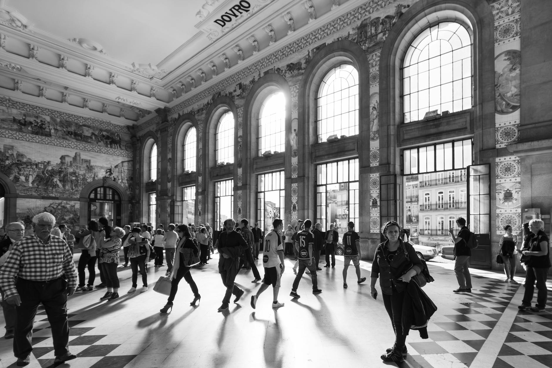 Interior of Sao Bento Railway Station with people walking