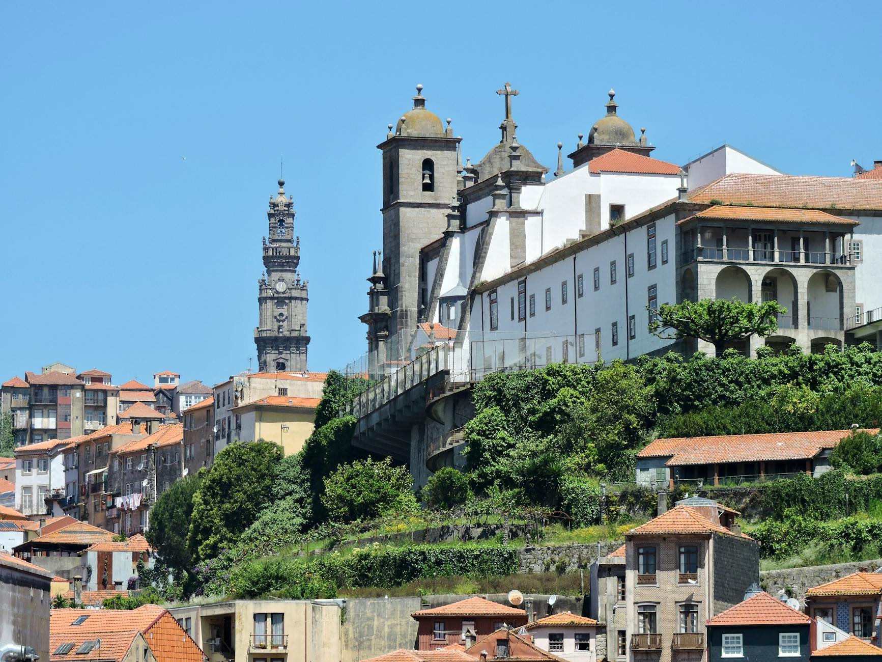 Clerigos Church and surrounding Porto cityscape under a clear sky