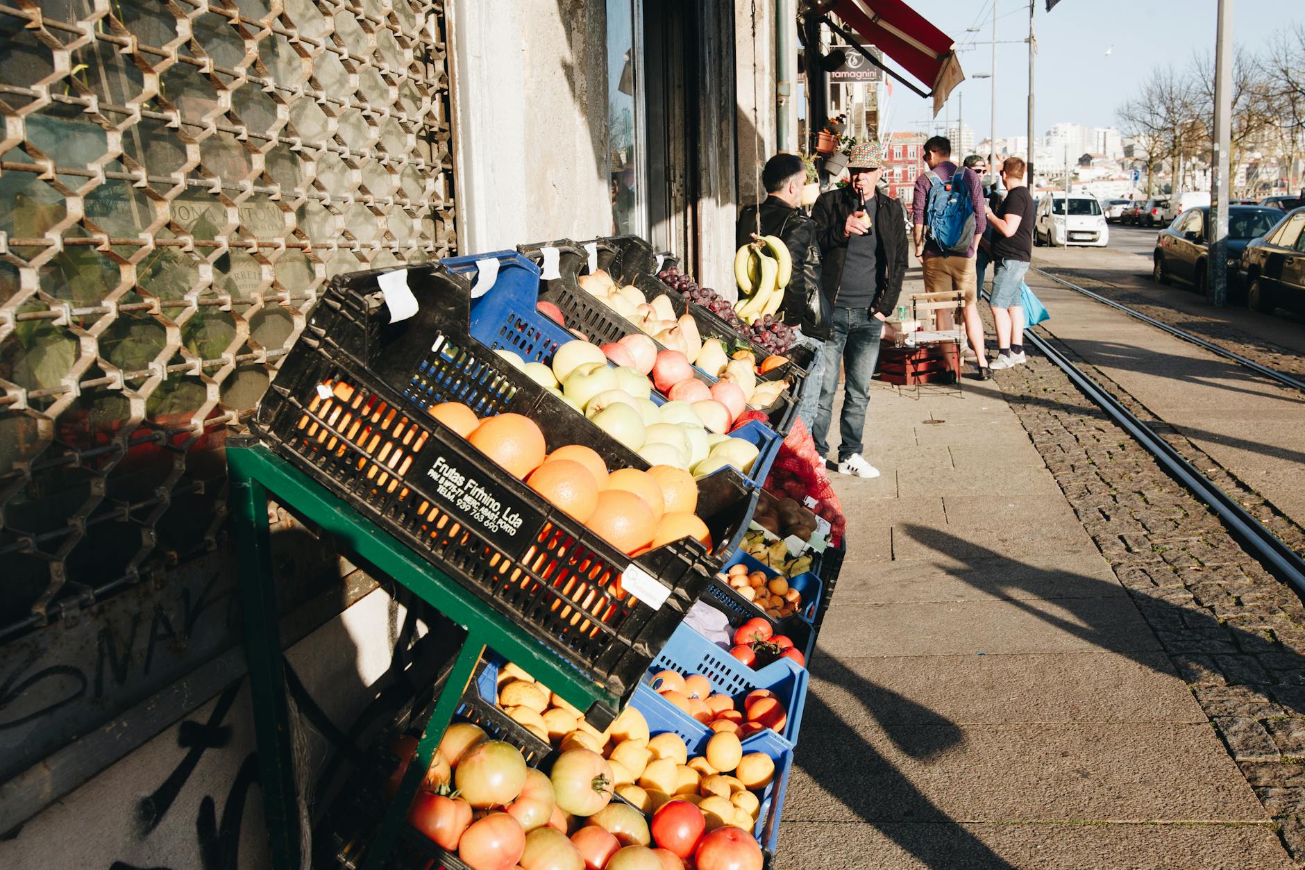 Porto street market with produce and shoppers