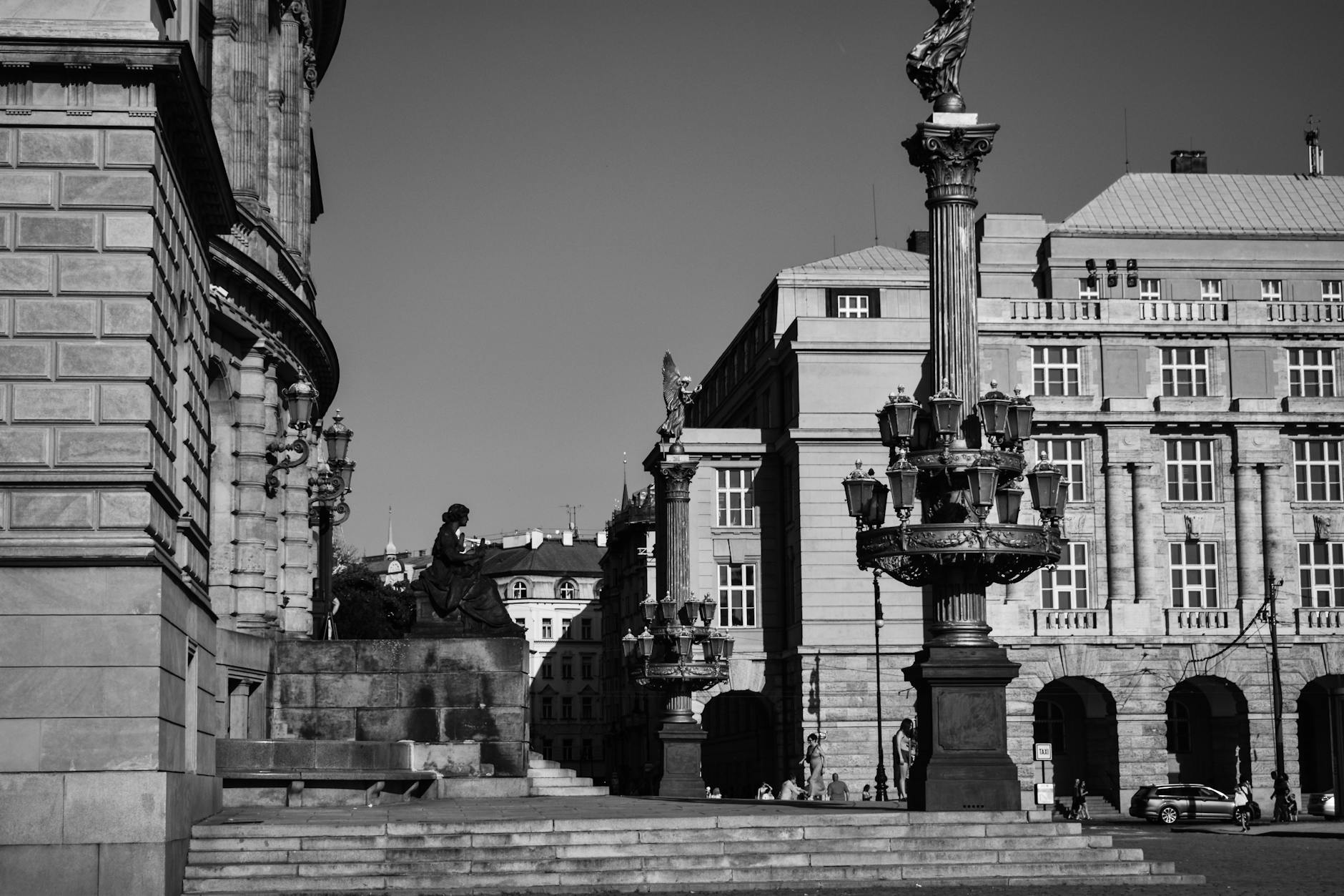 Historic Prague architecture with statues and columns