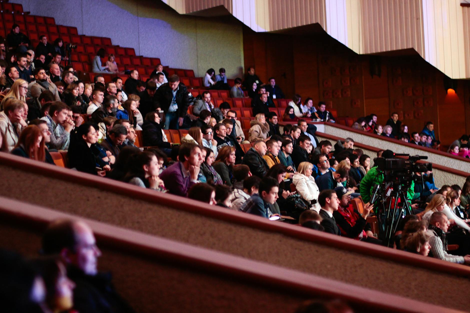 Conference audience seated indoors