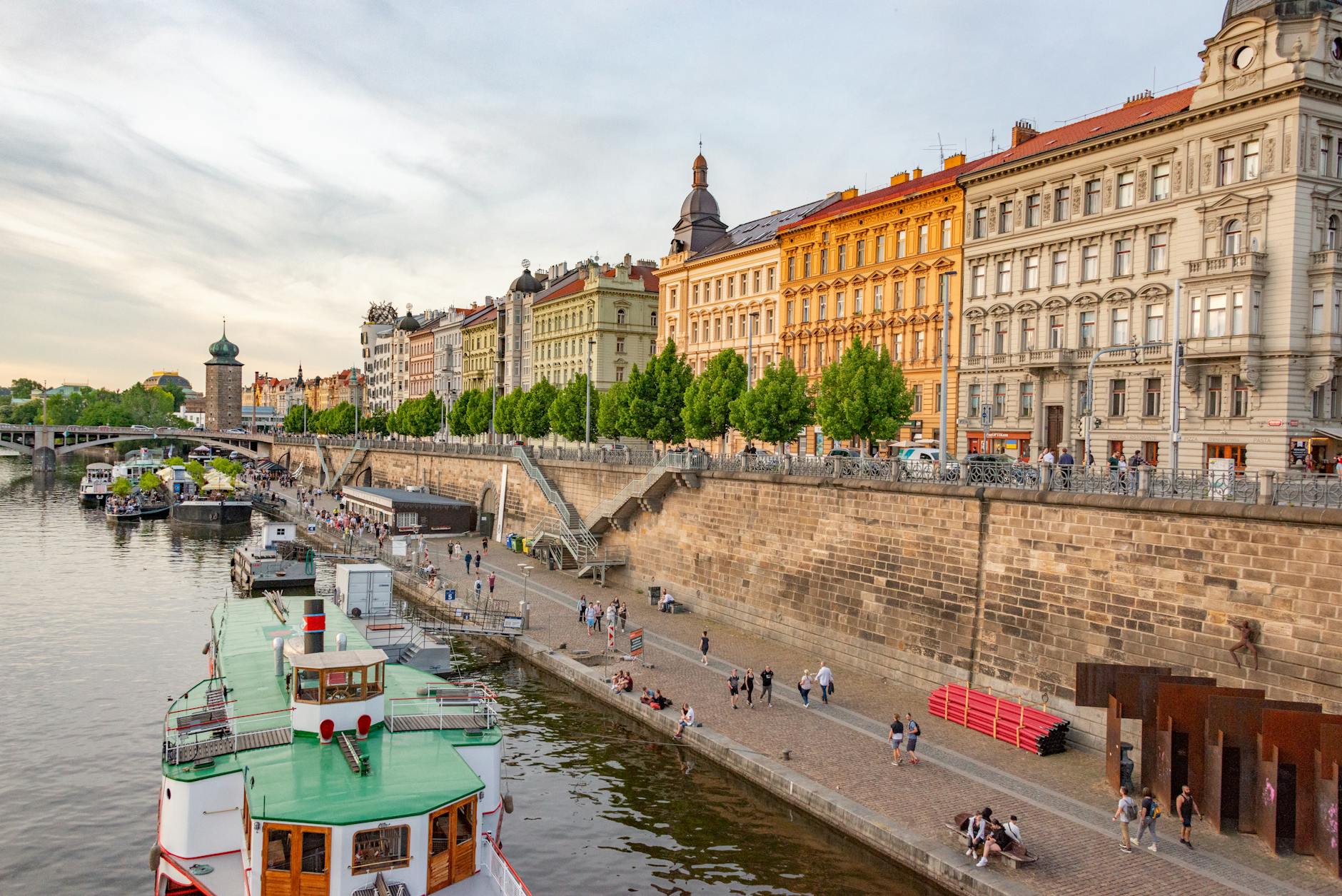 Vltava River promenade and historic architecture in Prague