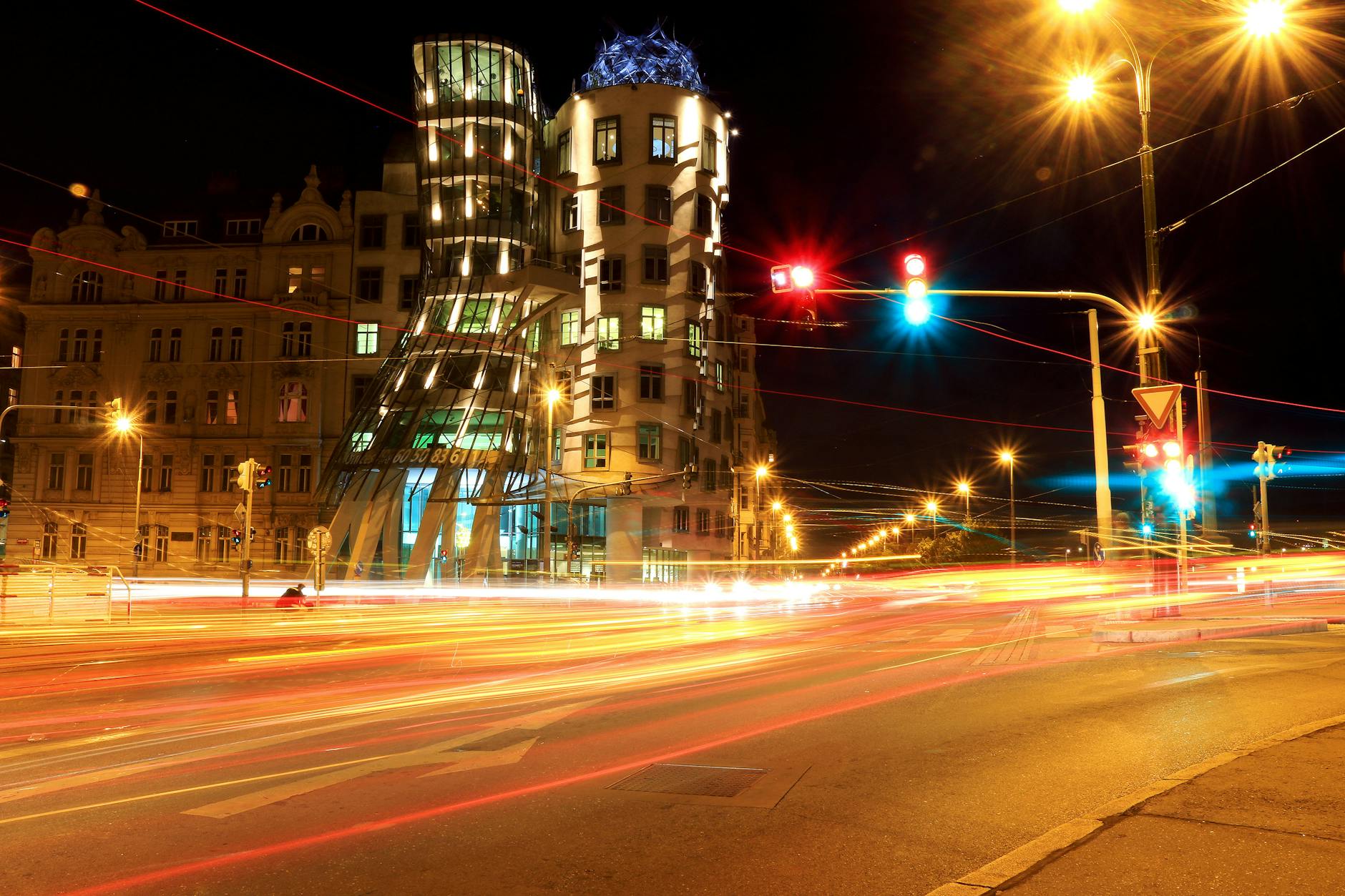 Night traffic near Prague's Dancing House