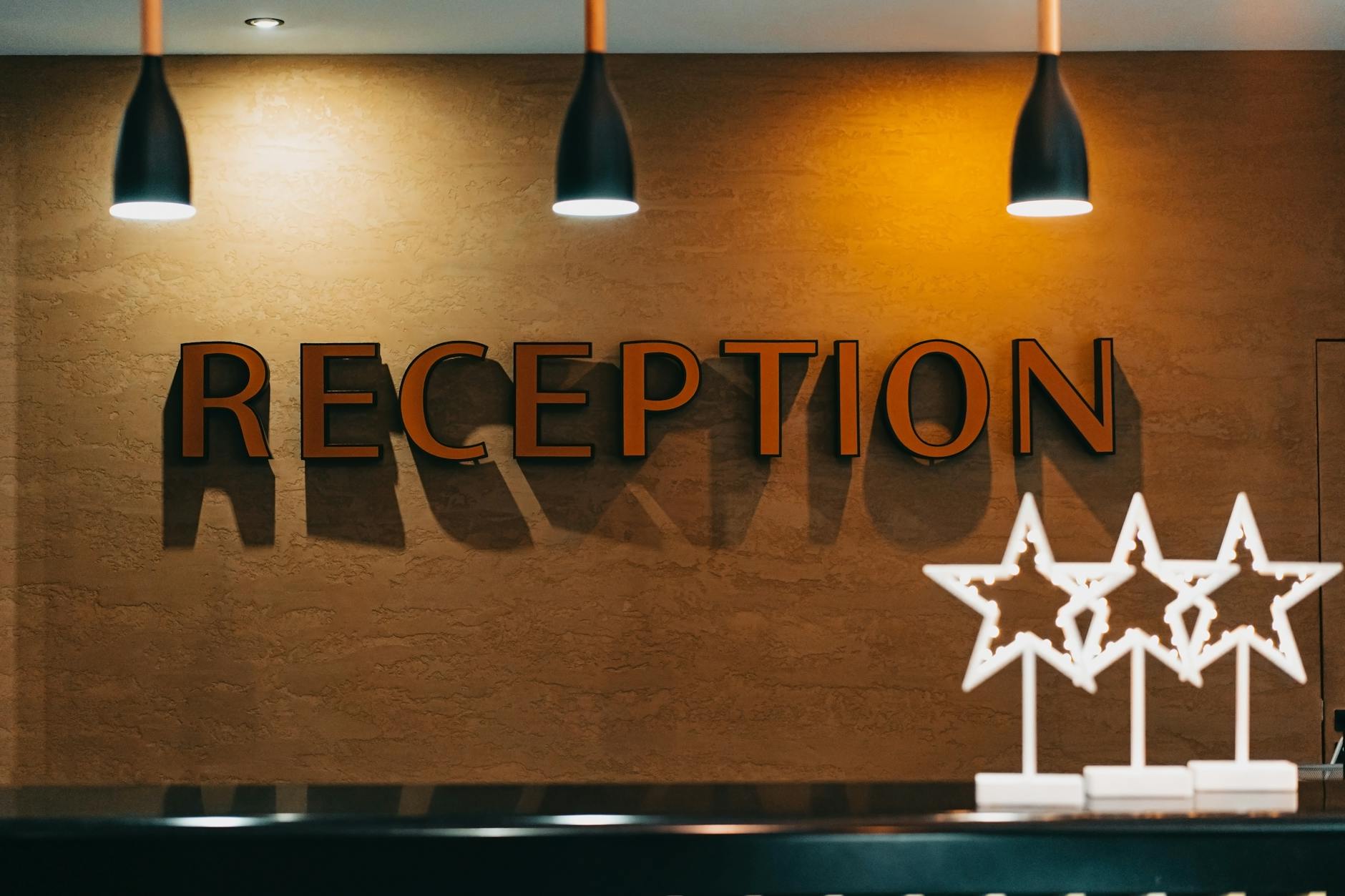 Elegant hotel reception area with illuminated signage