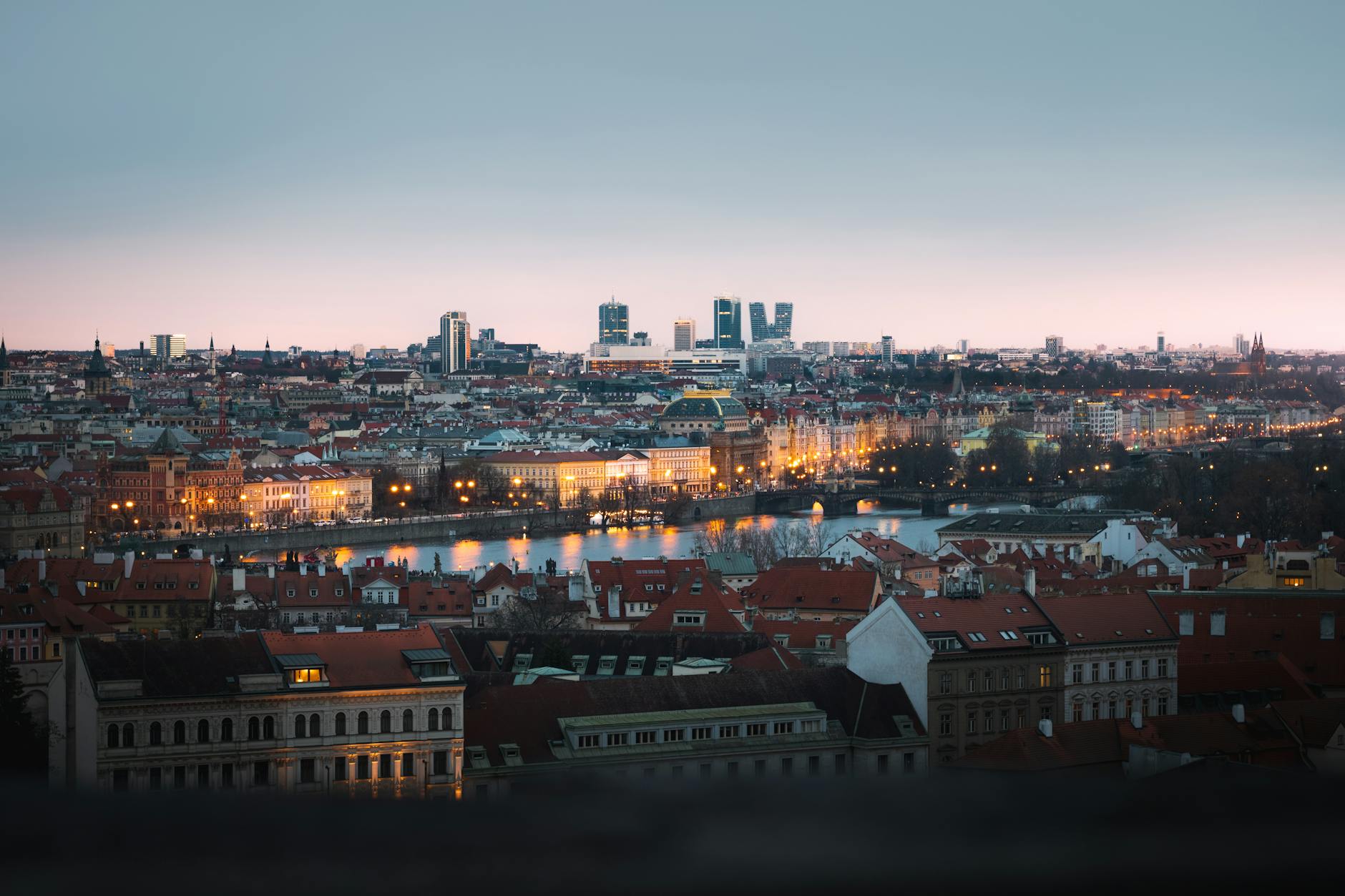 Prague cityscape at dusk with the Vltava River