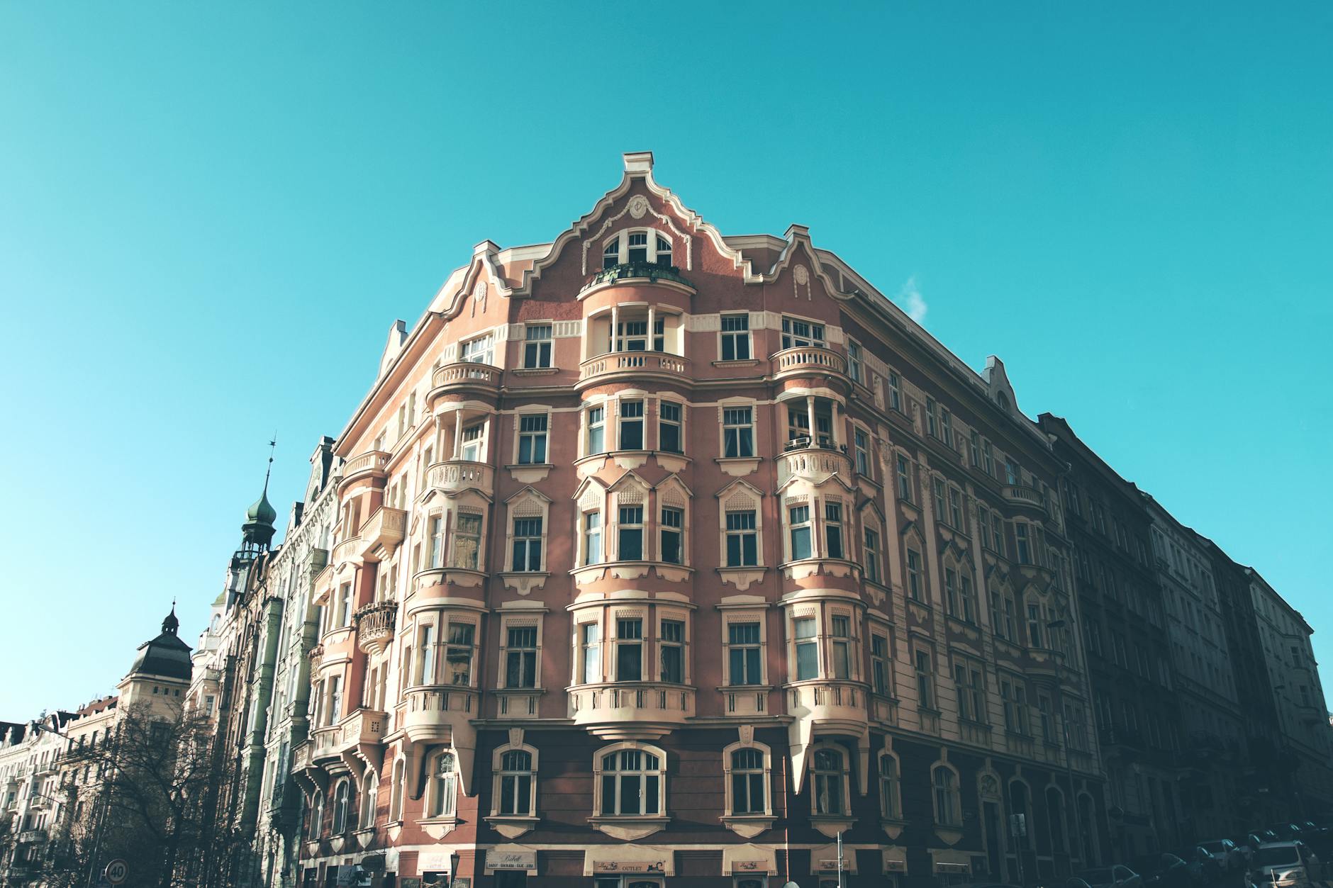 Vintage Prague building facade under a clear blue sky