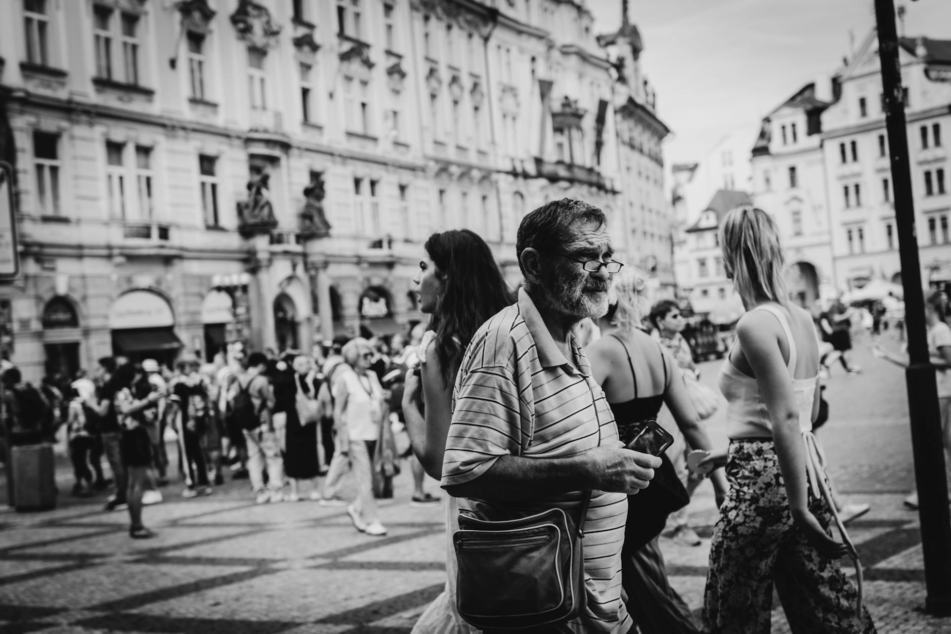 Black and white city life in Prague historic center
