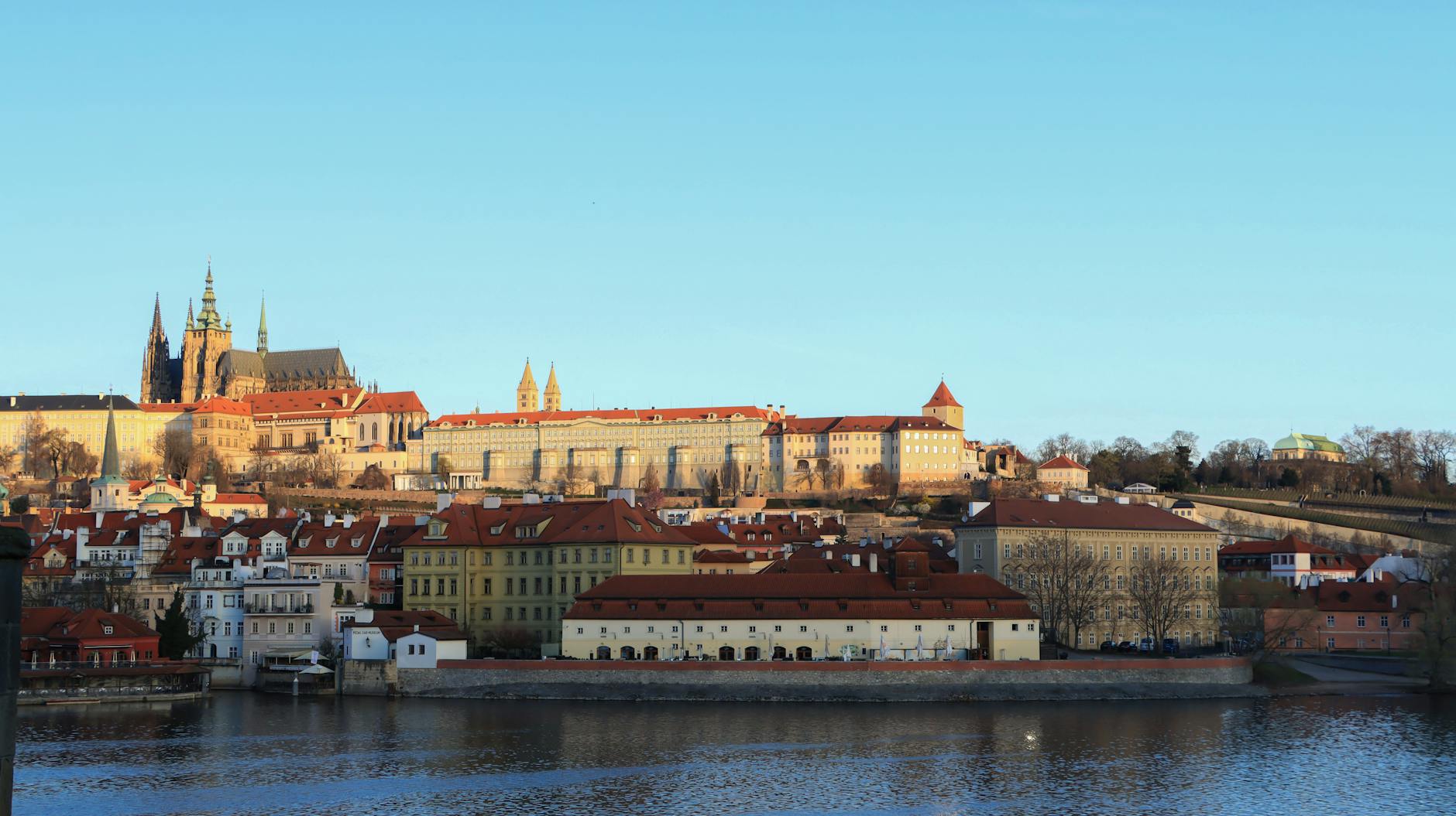 Prague Castle and the Vltava River in summer sunlight