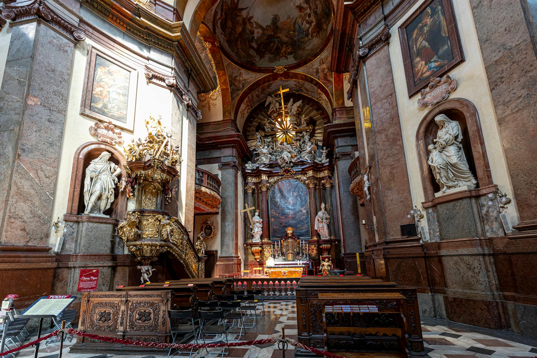 Baroque church interior in Prague with ornate architecture
