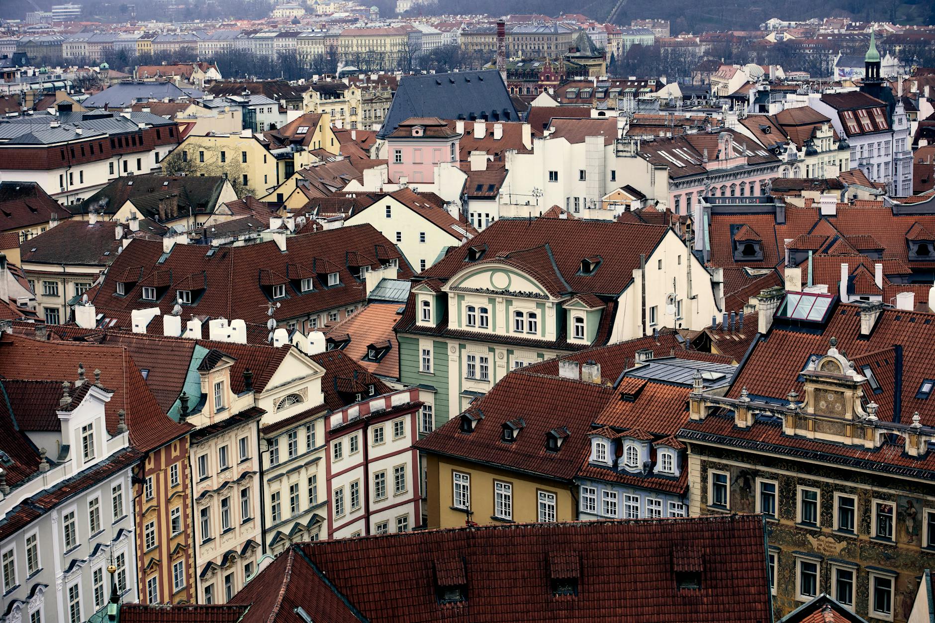 Aerial view of Prague rooftops and traditional architecture