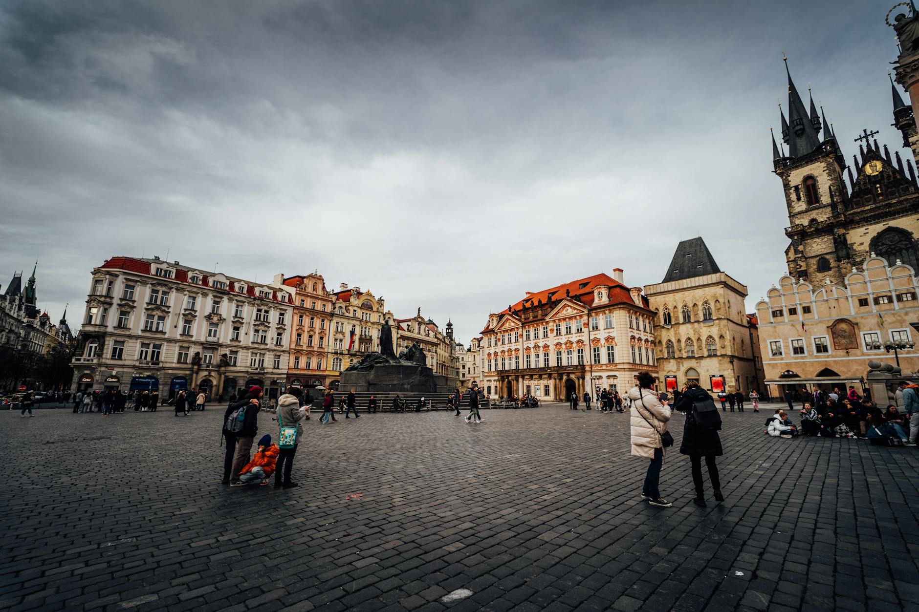 Prague Old Town Square with historic architecture and crowds