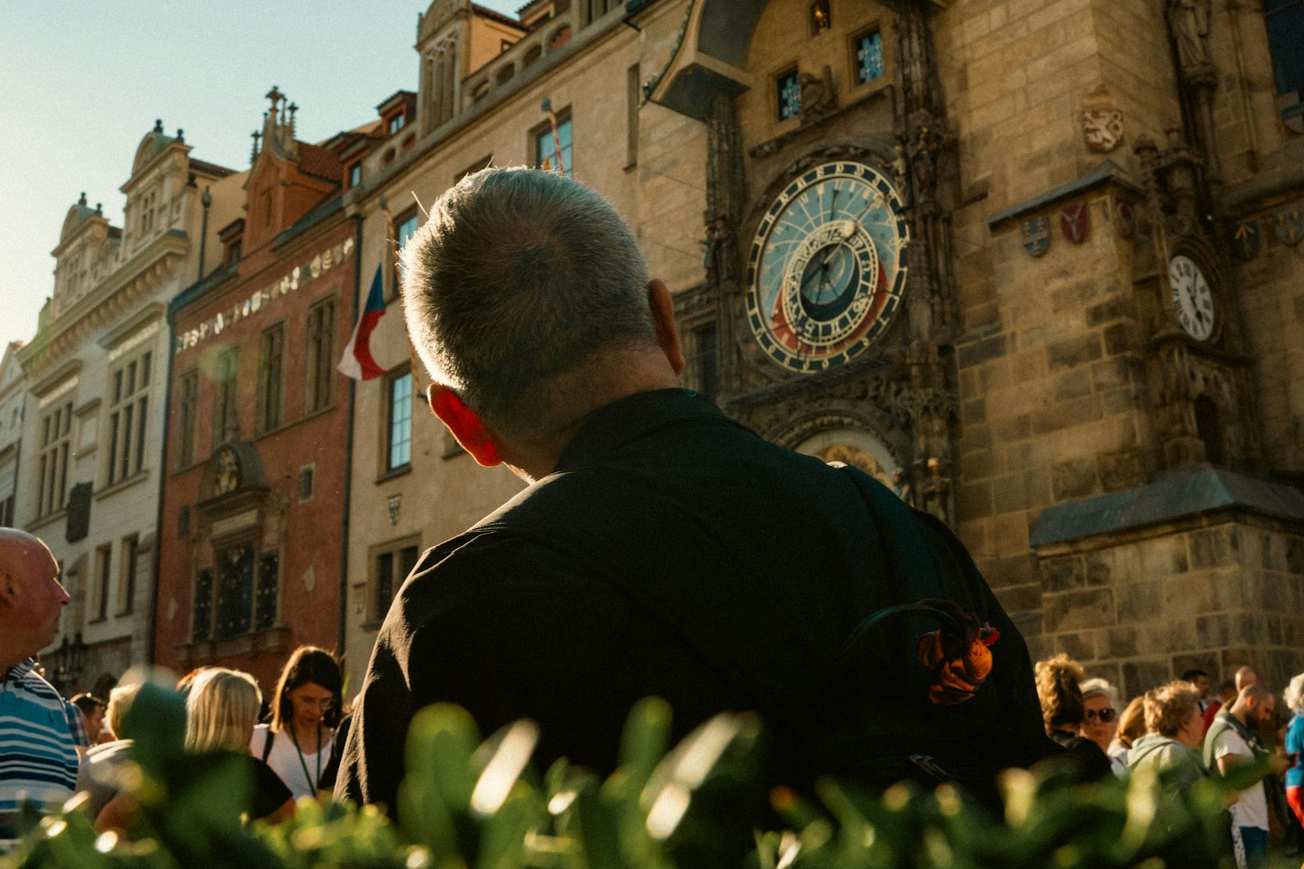 Tourists gathered around the Prague Astronomical Clock