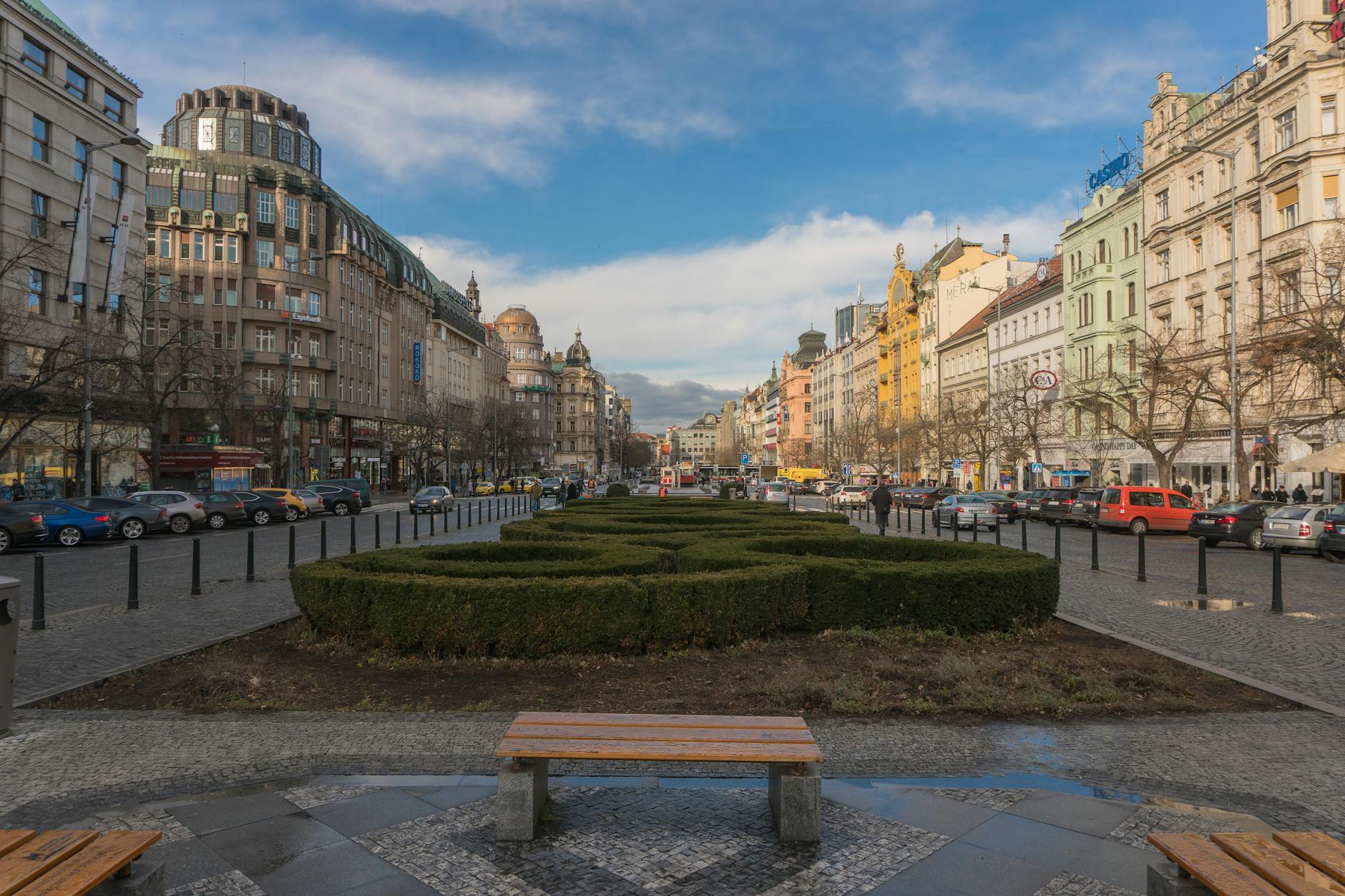 Wenceslas Square in Prague with historic buildings and city movement