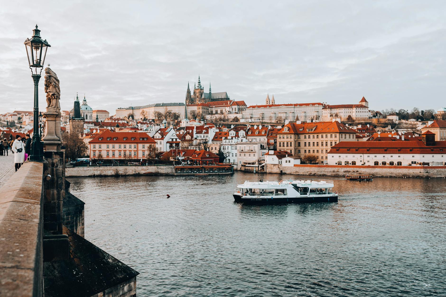 Autumn view of Prague Castle and the Vltava River from Charles Bridge