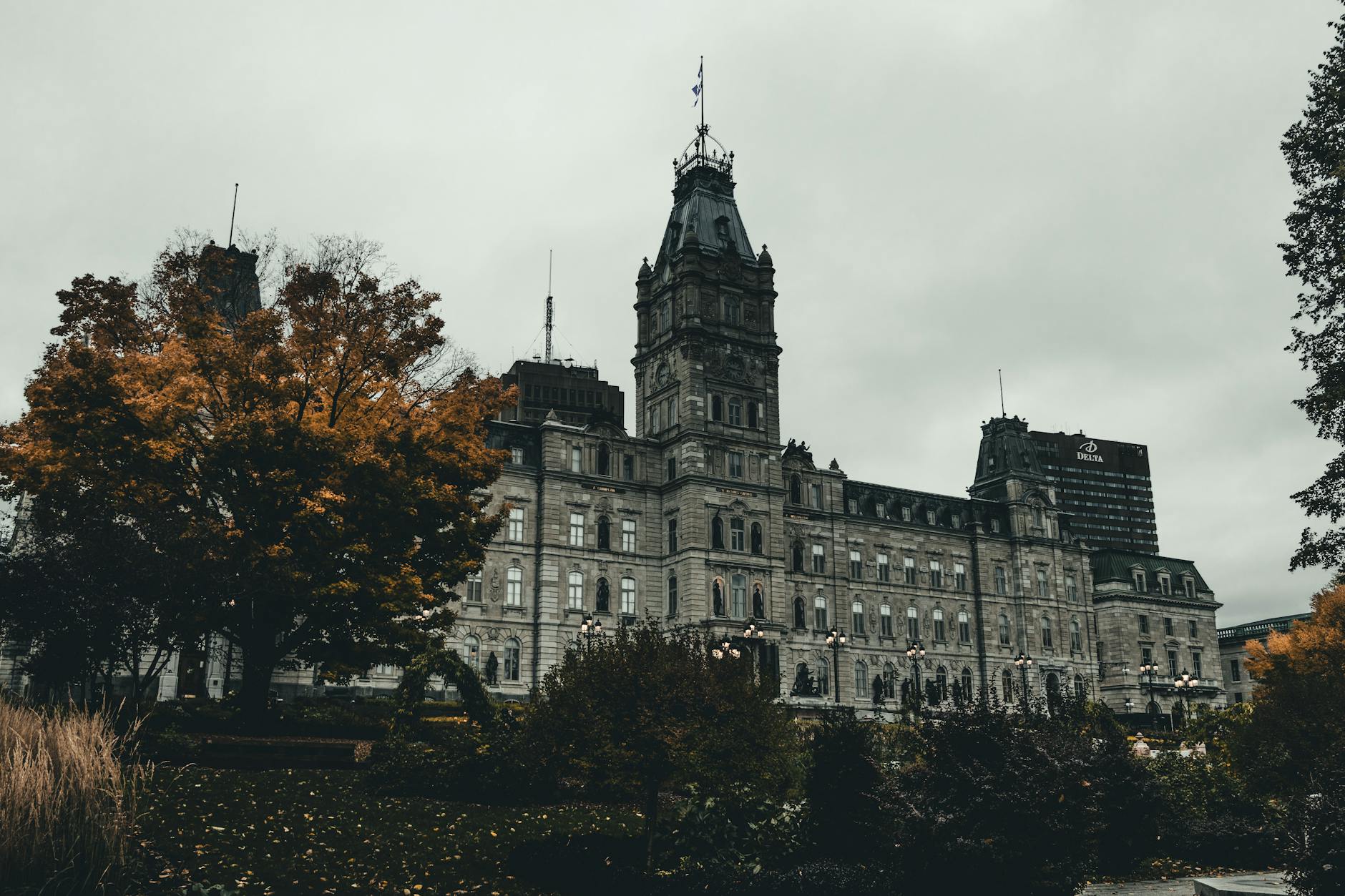 Quebec City Parliament Building surrounded by autumn foliage