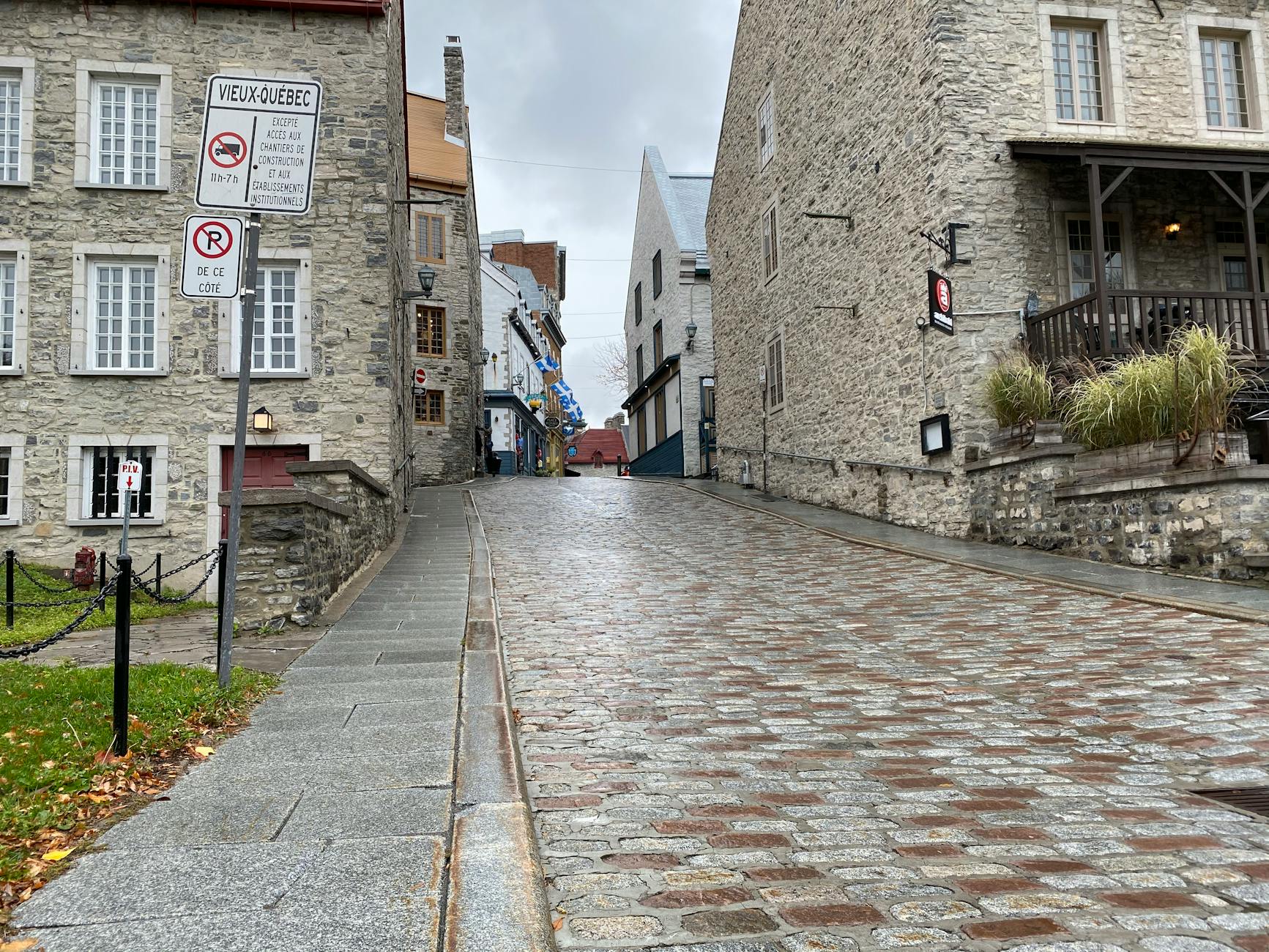 Cobbled street in Old Quebec City with historic stone buildings