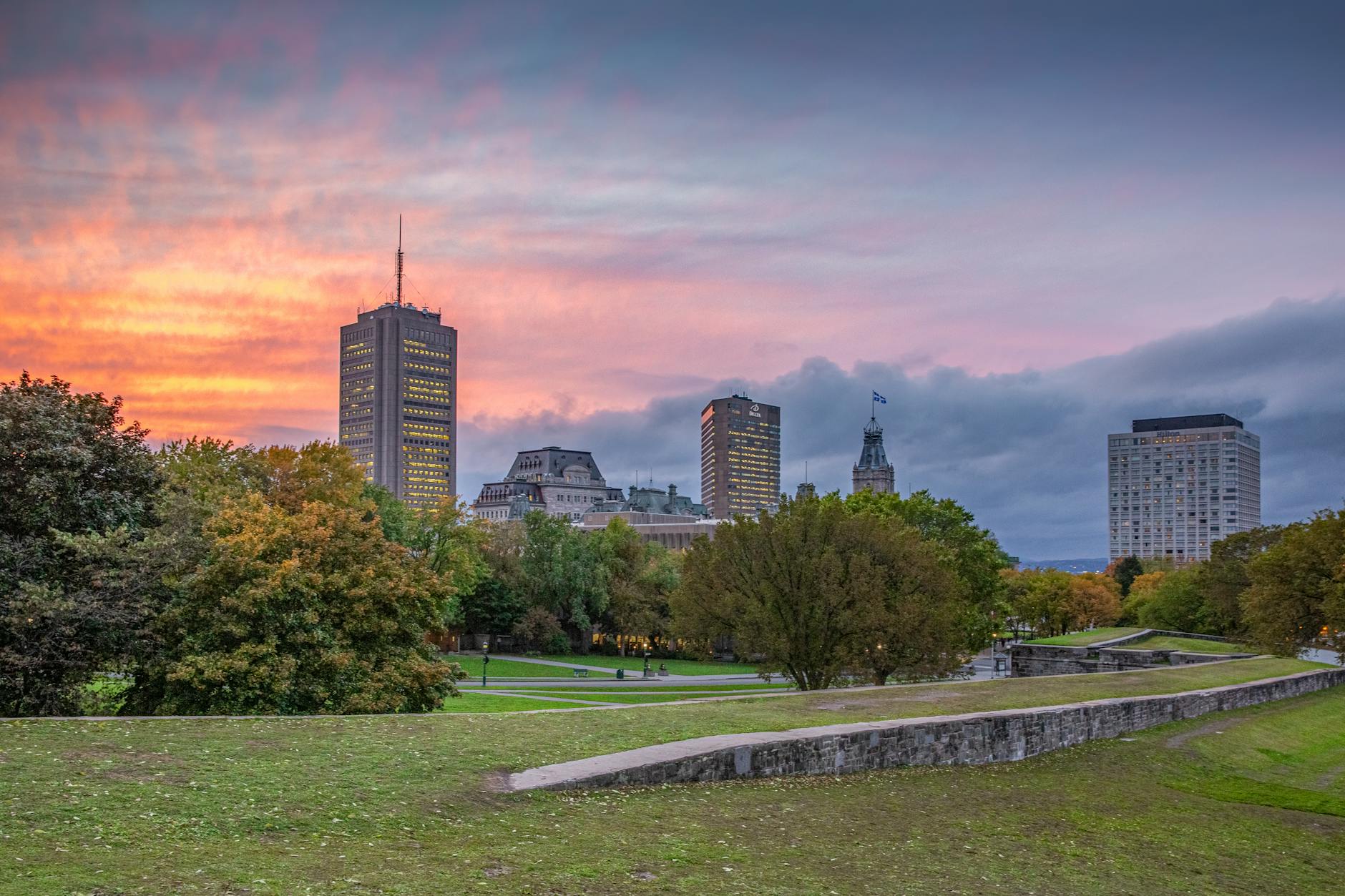 Quebec City skyline at sunset with parks and architecture