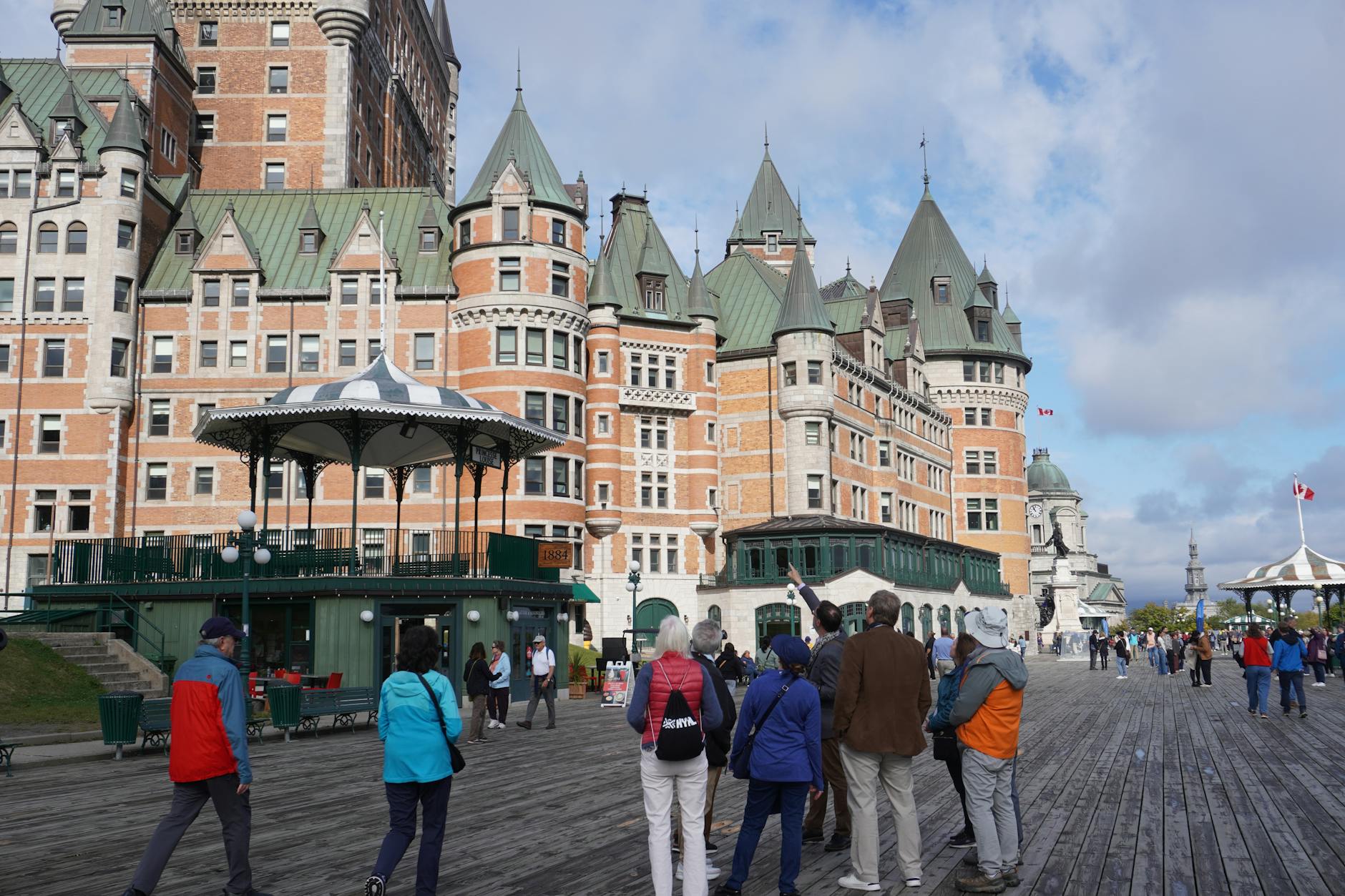 Visitors looking toward Chateau Frontenac on a clear day in Quebec City