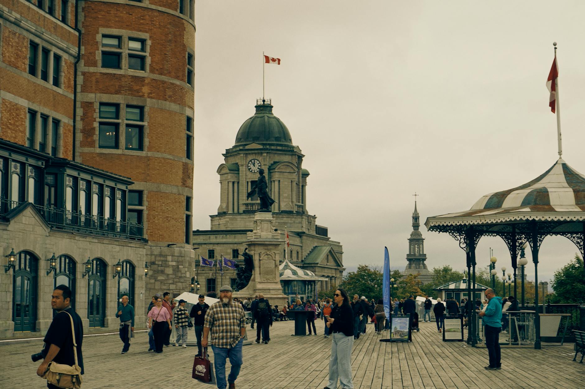 Busy promenade in Old Quebec City with historic architecture