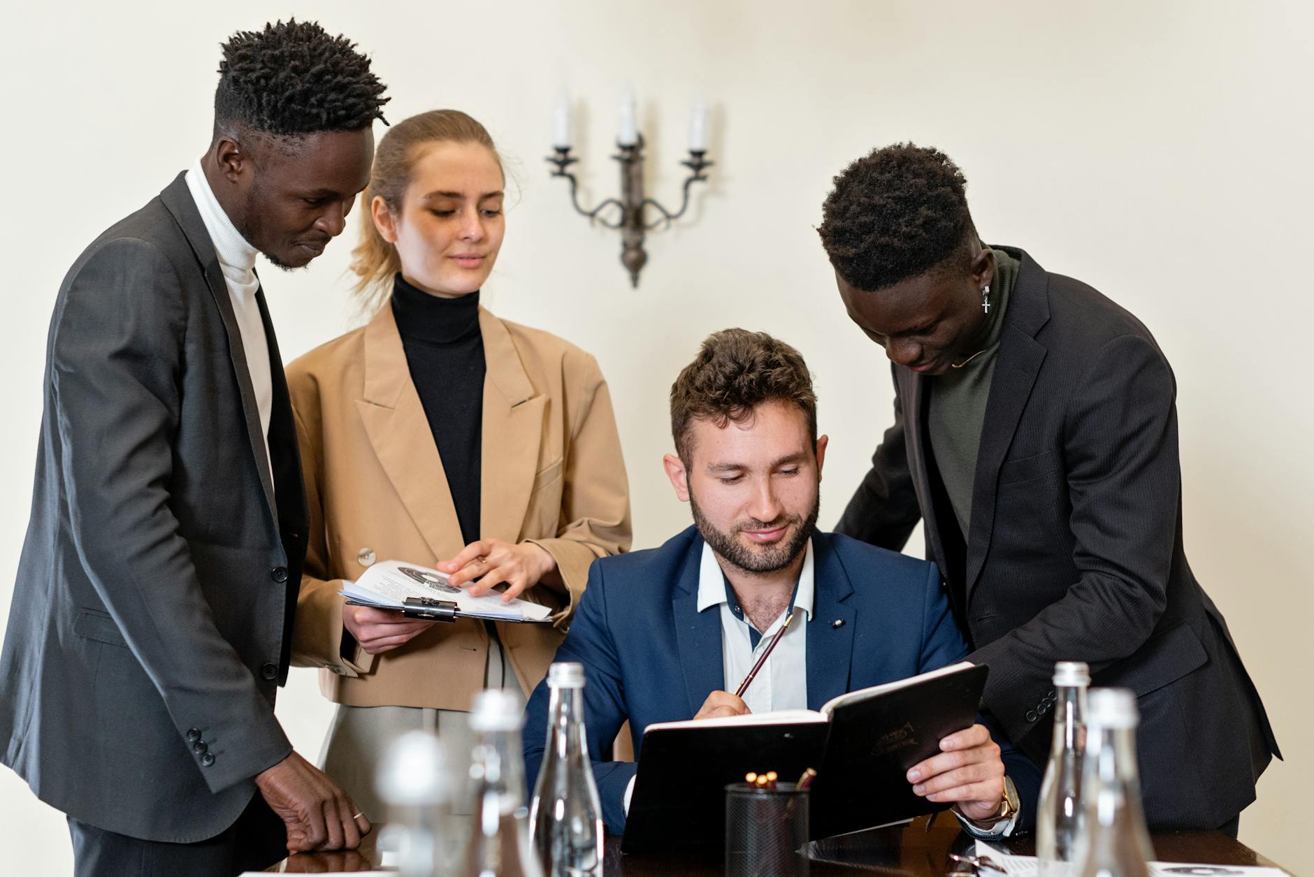Professionals collaborating during a business meeting in an office