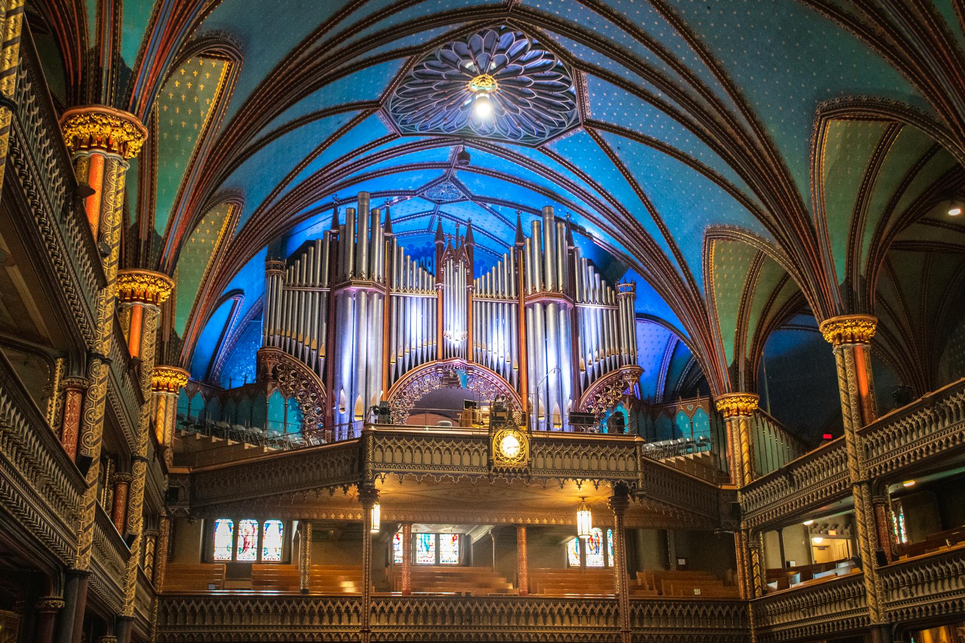 Cathedral interior with pipe organ and detailed architecture
