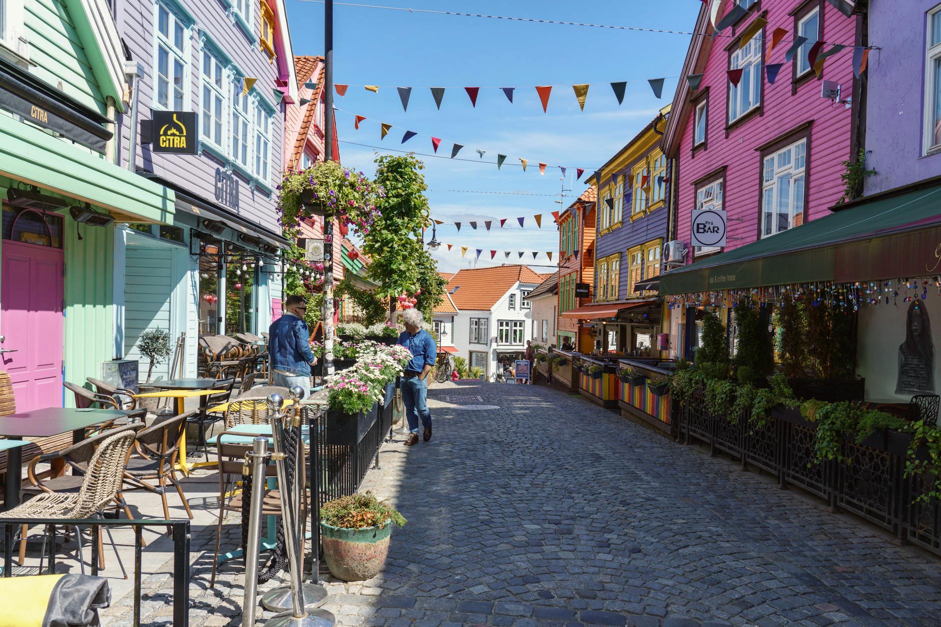 Outdoor dining street in Stavanger for client meal planning.