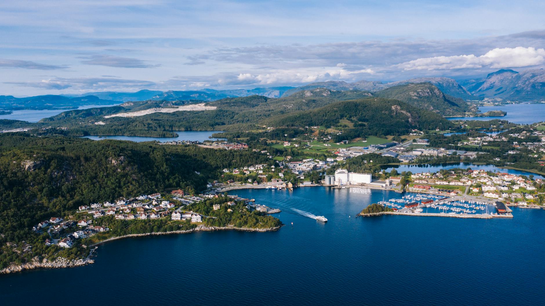 Aerial Stavanger coastline and harbor for arrival planning.